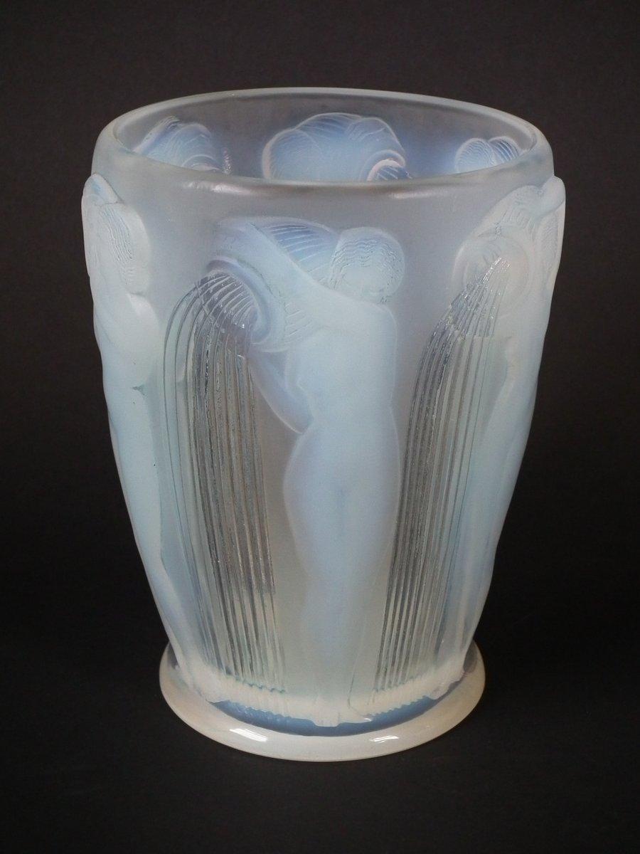René Lalique opalescent glass 'Danaides' vase. This pattern features the daughters of Danaus stood pouring water from a vessel. Stencilled makers mark, 'R. Lalique FRANCE'. Book reference: Marcilhac 972.