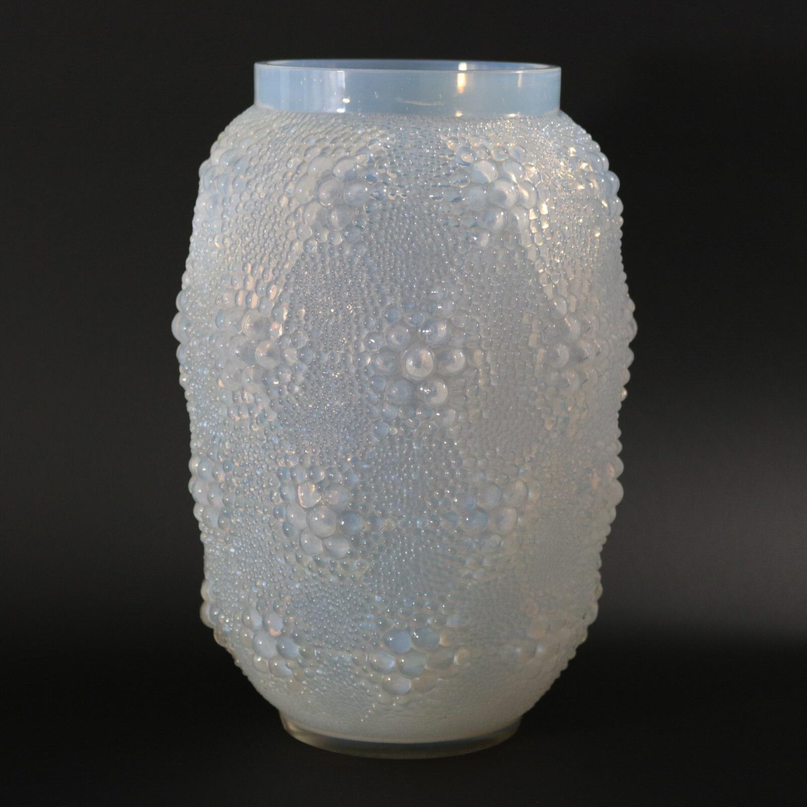 Rene Lalique opalescent glass 'Davos' vase. This pattern features bubbles. Stenciled makers mark, 'R. LALIQUE FRANCE'. Book reference: Marcilhac 1079.