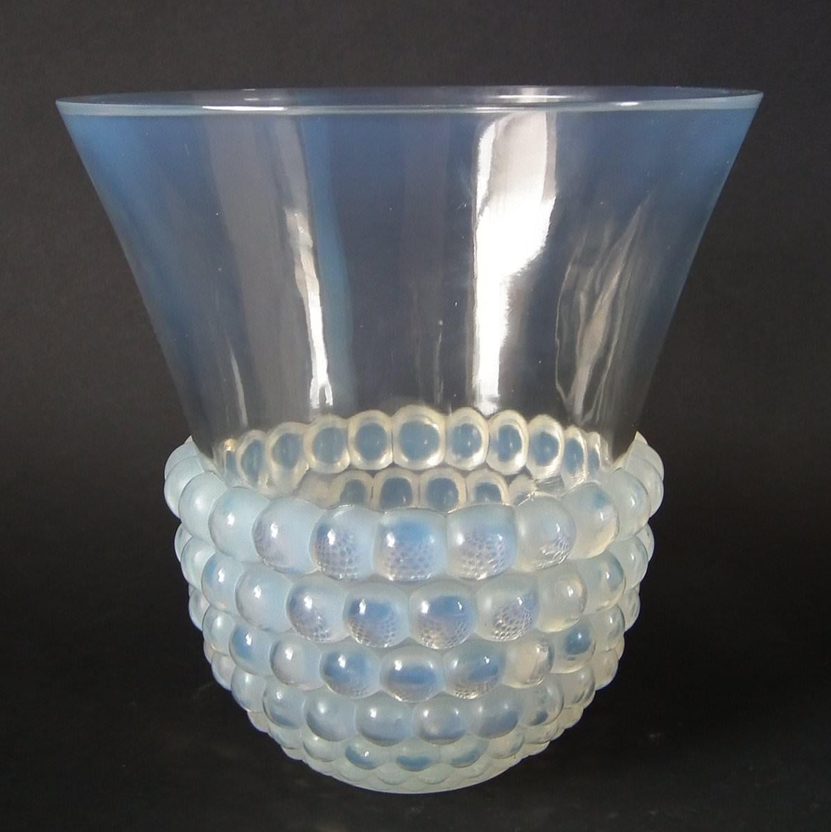 Rene Lalique opalescent glass 'Graines' Vase. The vase is decorated around the bottom of the outside with hemispherical bubbles. When you look into the bubbles, they beautifully relect/refract bubbles from all around the vase. Stenciled makers mark,