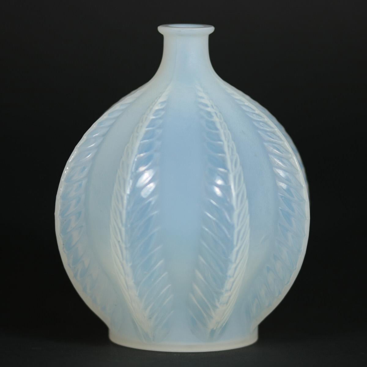 Rene Lalique opalescent glass 'Malines' vase. Pattern features fern fronds, climbing up the sides. Stencilled makers mark, 'R LALIQUE FRANCE' to the underside. Book reference: Marcilhac 957.