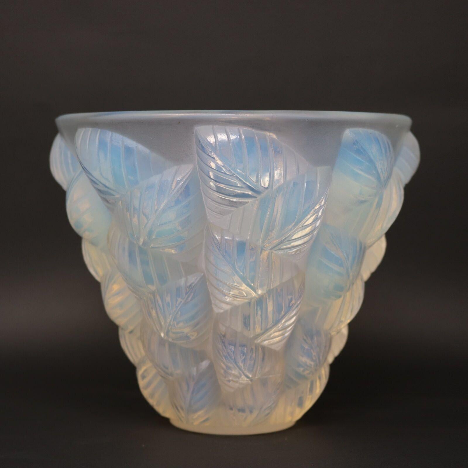 Rene Lalique Opalescent Glass 'Moissac' Vase. This pattern features deeply embossed leaves around the sides. Wheel cut makers mark, 'R LALIQUE FRANCE' to the underside. Book reference: 'R. LALIQUE Catalogue Raisonné De L'Oeuvre De Verre', by Felix