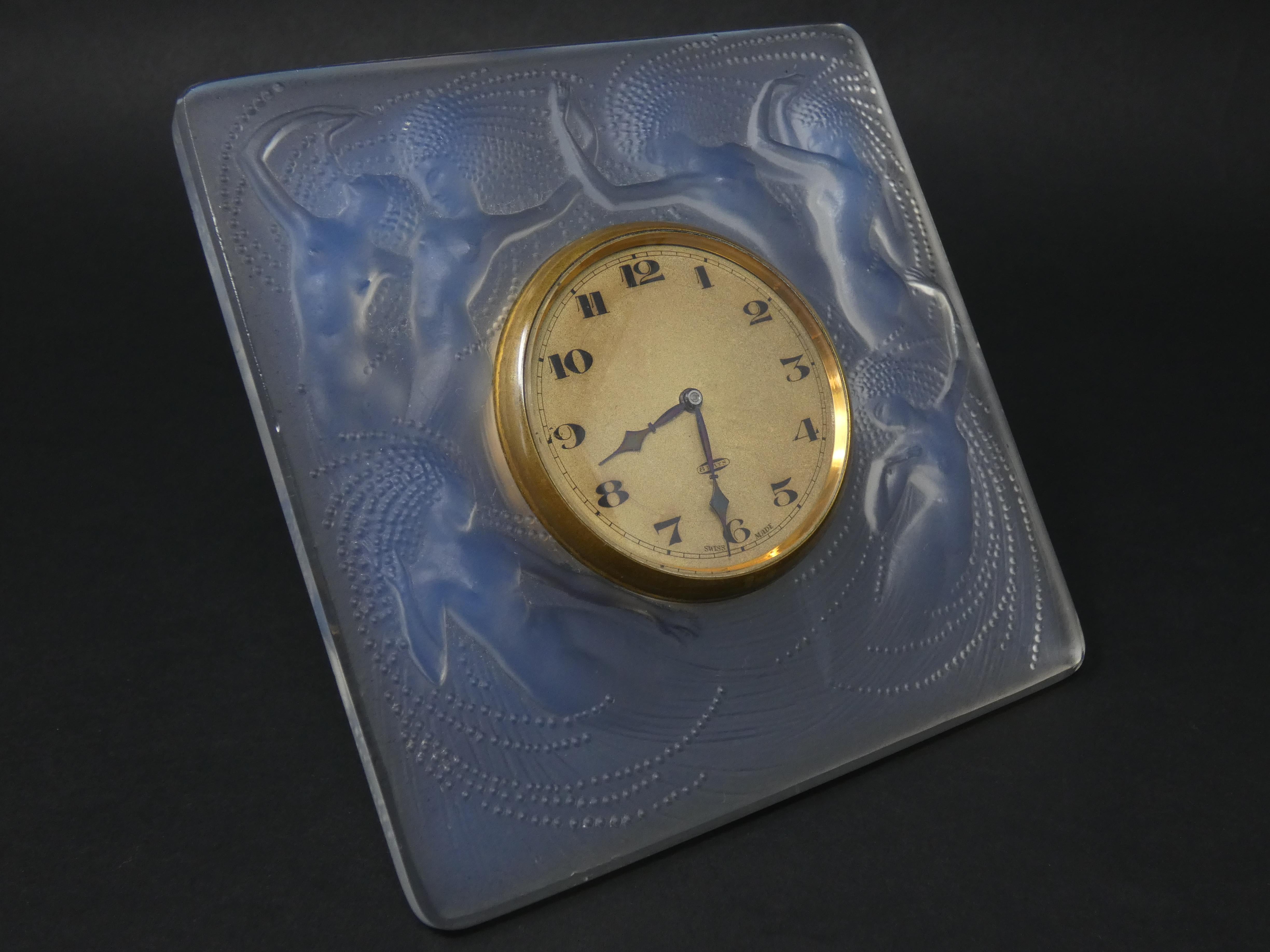 René Lalique Opalescent glass 'Naiades' clock. Engraved makers mark, 'R Lalique France '. Book reference: Marcilhac 764.