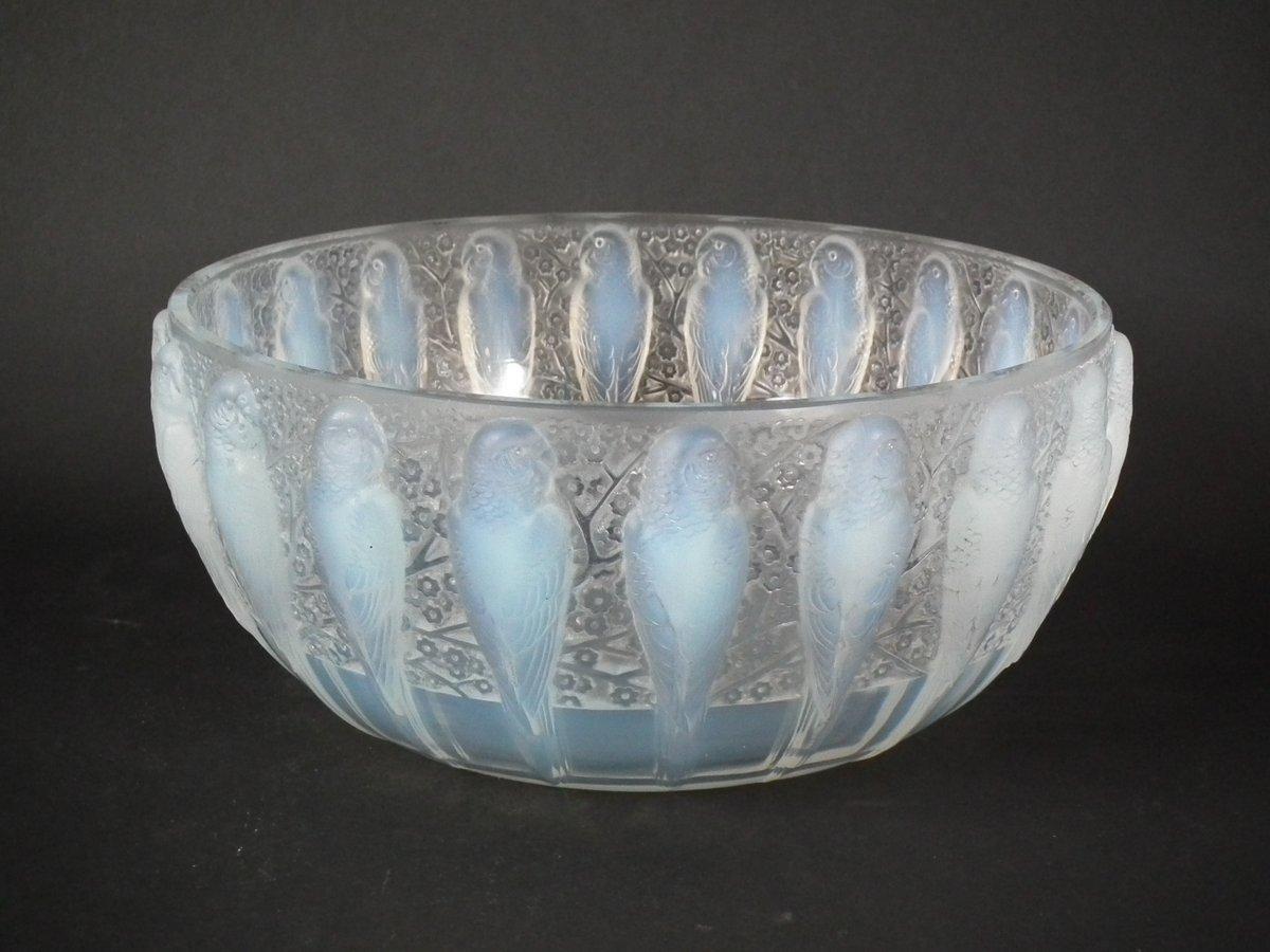 Rene Lalique opalescent glass 'Perruches' bowl. Grey patina. This pattern features parakeets around the outside, with flowers in between. Stenciled makers mark, 'R. Lalique FRANCE' to the underside. Book reference: Marcilhac 419.