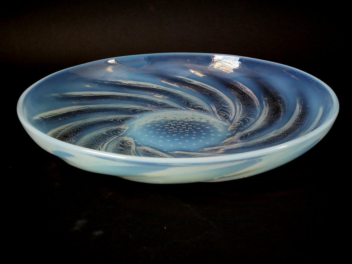 Rene Lalique clear and opalescent glass 'Poissons' coupe (or shallow bowl). This pattern features a spiral of fish, surrounding a central well of bubbles. Stencilled makers mark, 'R.Lalique FRANCE'. Book reference: Marcilhac 3262.