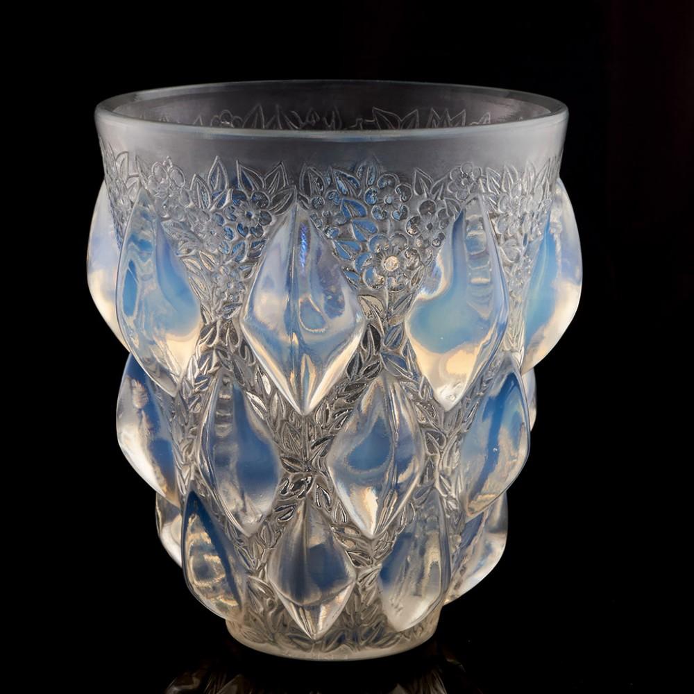 Rene Lalique Opalescent Rampillon Vase, Designed 1927

Additional Information:
Heading : R.Lalique Rampillon glass vase
Date : Designed 1927
Period : Interwar
Origin : Wingen-sur-Moder, France
Colour : Opalescent
Pattern : Rampillon Marcilhac no.