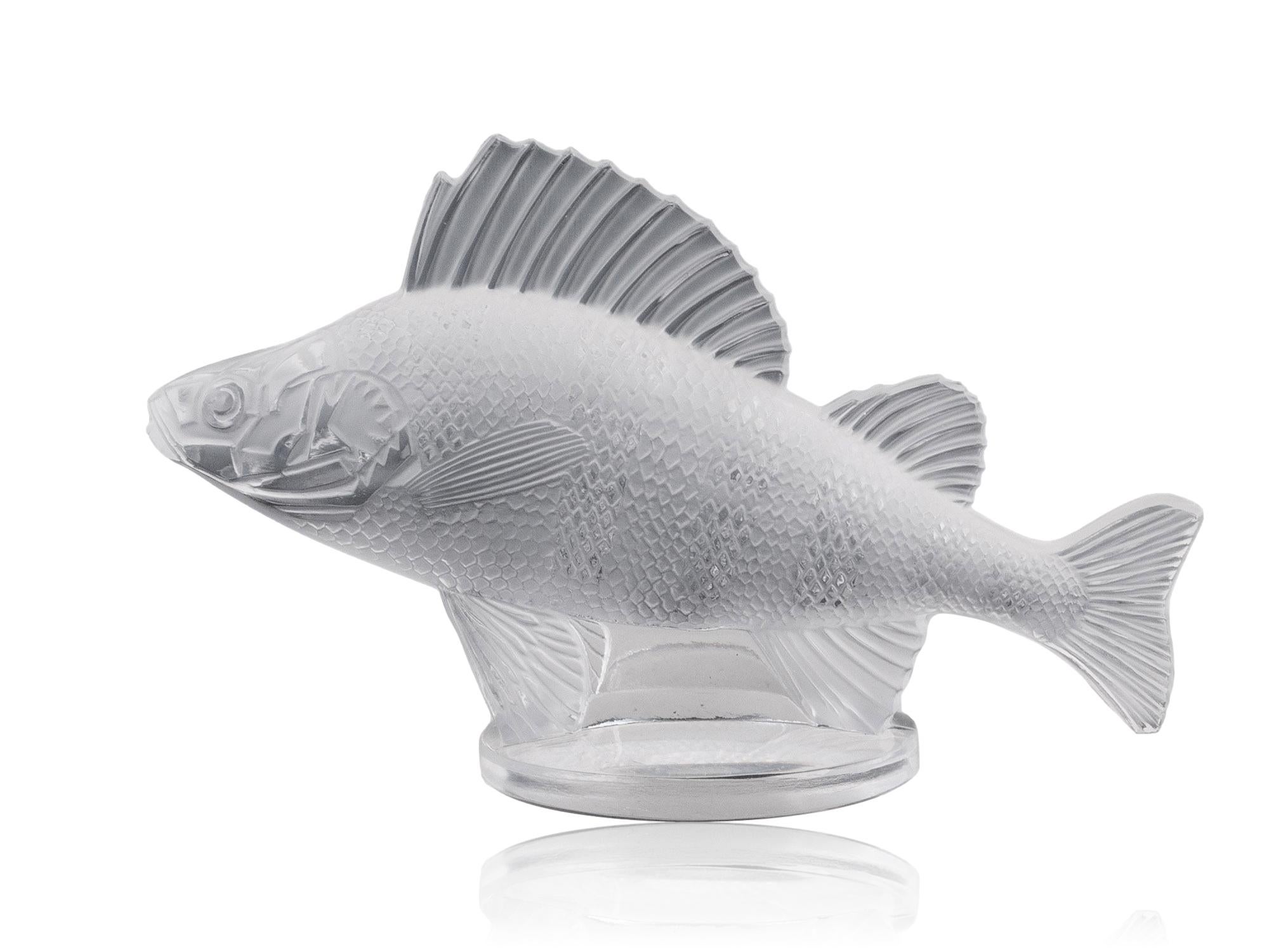 Rene Lalique Original Car Mascot

From our Lalique collection, we are delighted to offer the Rene Lalique Perche Poisson Car Mascot. The Car Mascot modelled from Rene Lalique's original catalogue of hood ornaments model number #1158 Perche or Perch.