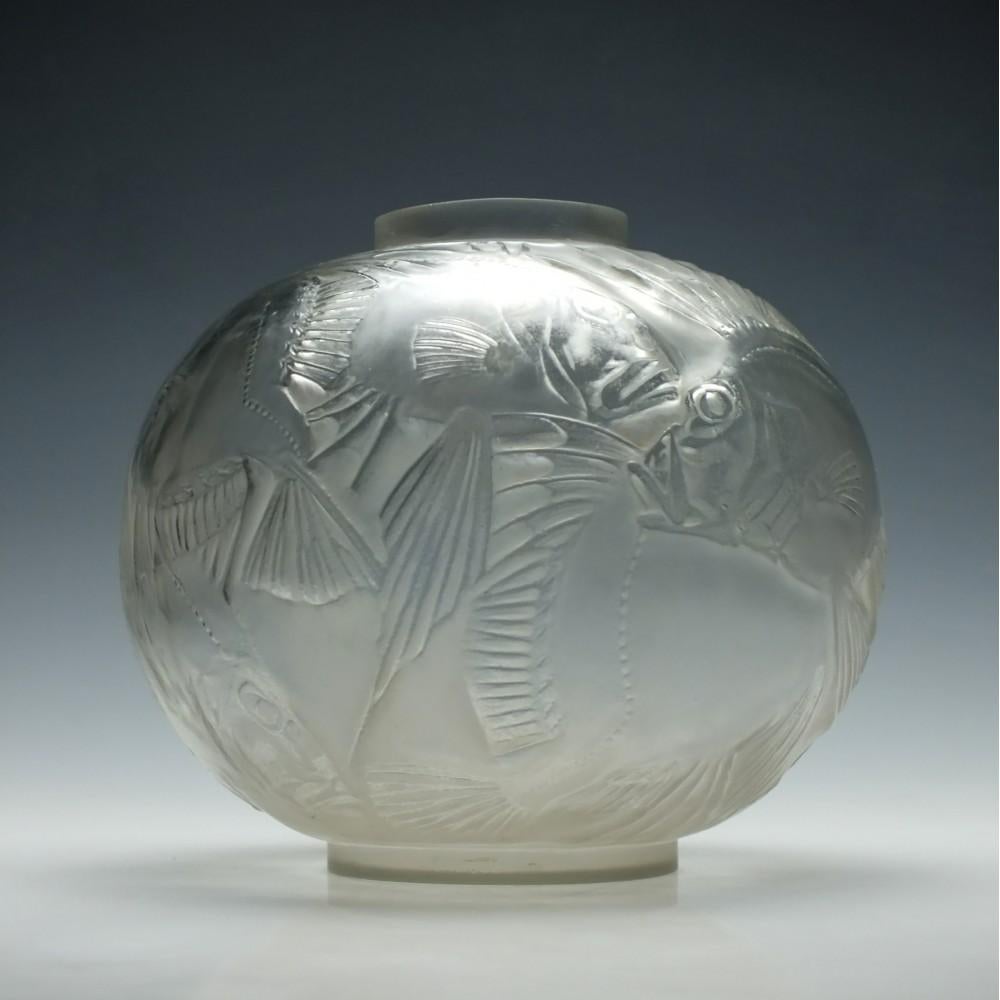 Rene Lalique Poissons opalescent vase Marcilhac no. 925

Designed 1921

Signed R Lalique on the base.