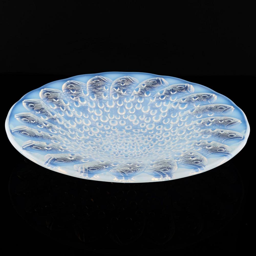 Rene Lalique Roscoff Coupe Ouverte - Marcilhac 10-383, Designed 1932

Additional Information:
Heading : Rene Lalique Roscoff coupe
Date : Designed 1932
Origin : Wingen-sur-Moder, France
Bowl Features : Moulded fish design with bubbles - opalsecent
