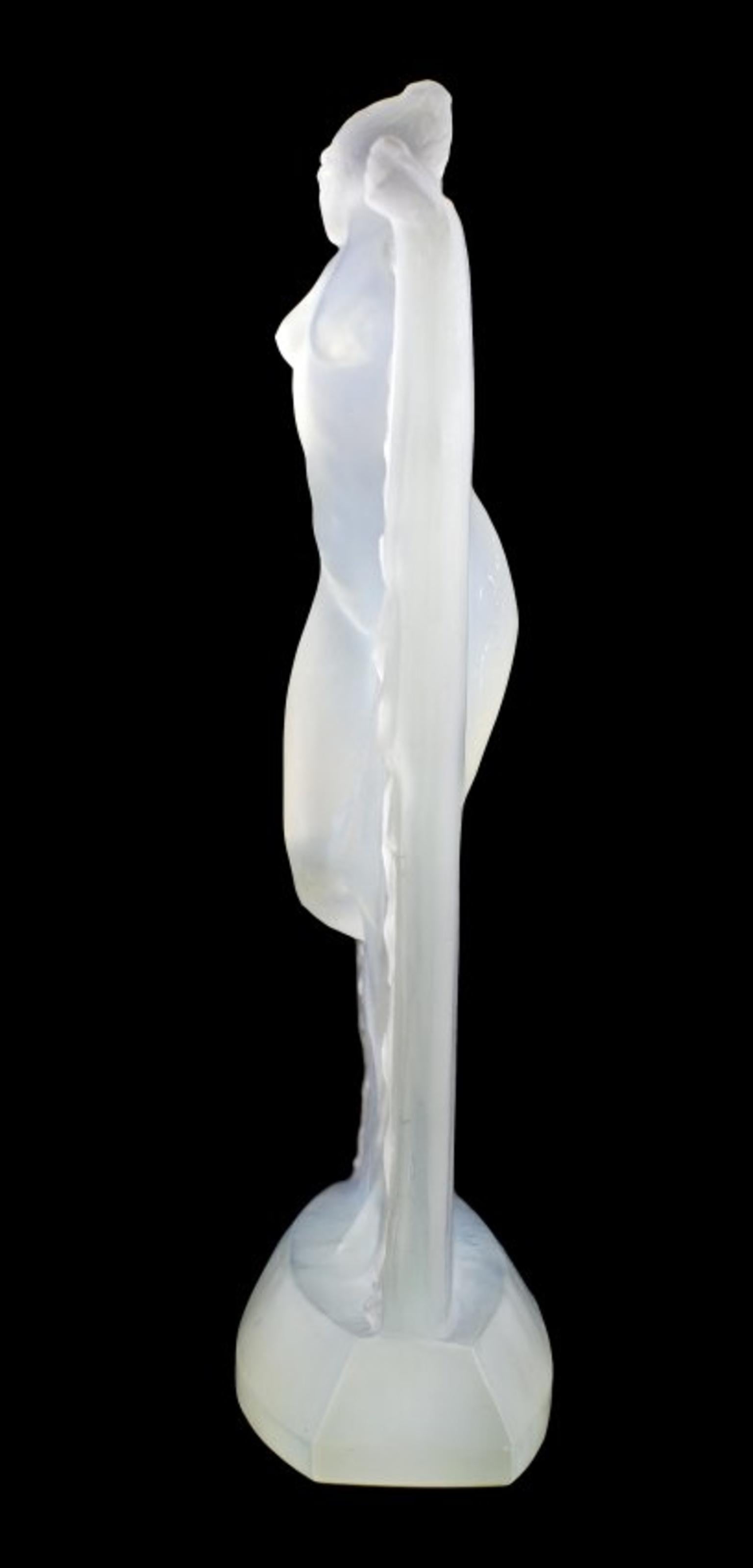 René Lalique
'Suzanne'
An opalescent glass statuette,
Model introduced 1925
Marcilhac 833 
Measures: 9.12 in.(22.8 cm.) high 
Wheel-carved R. Lalique, France.