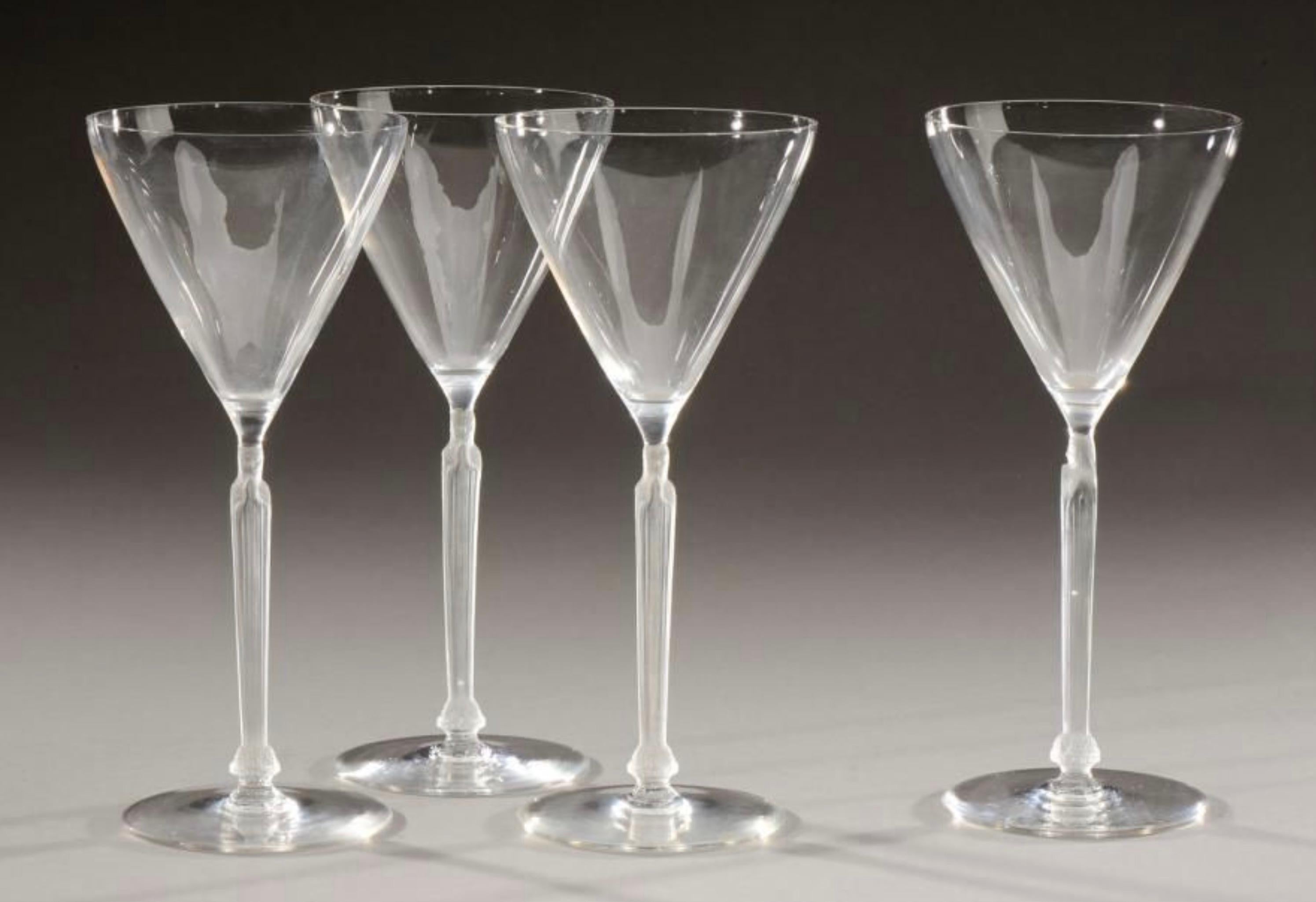 René Lalique clear glasses with round base and frosted robed female stem
Set of five glasses in plain, blown-moulded glass, model 