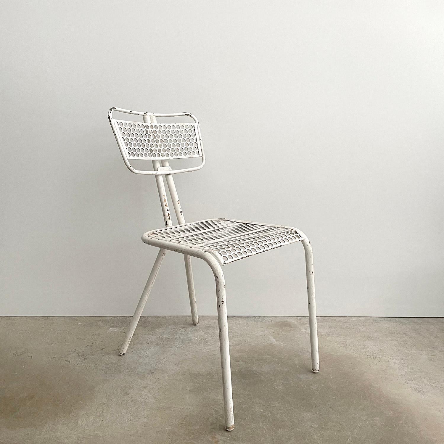 René Malaval for Bloc Metal 
France, post war 
This vintage metal side chair will add wonderful texture and rich history to any room
Composed of perforated metal backrests/seats 
Tubular steel legs 
Surprisingly comfortable
Unique architectural