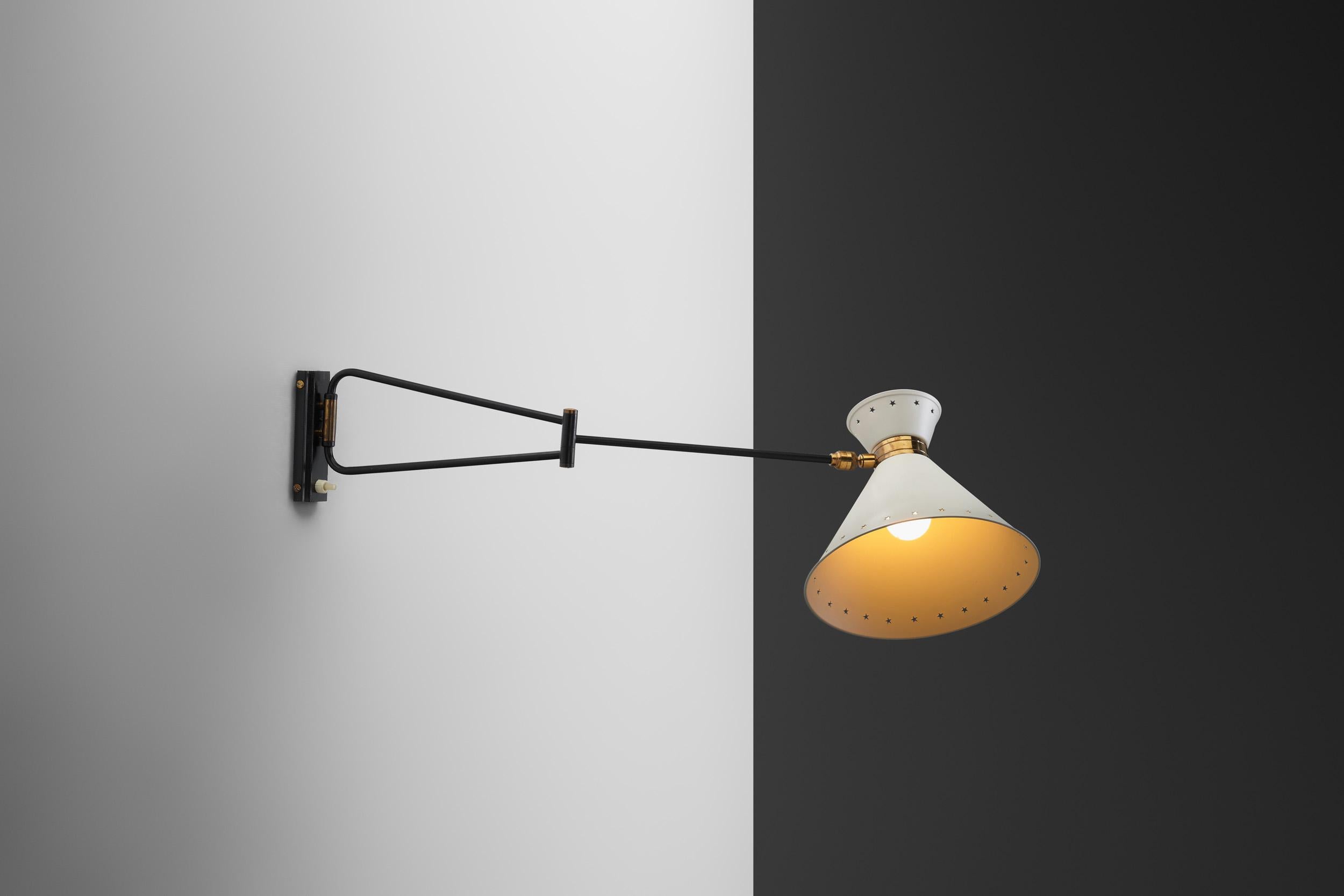 This swing arm “Diabolo” Wall Light was designed by René Mathieu for Lunel, and is a shining example of timeless elegance and innovative design. René Mathieu, was a prominent figure in mid-20th century French design, and was known for his ability to
