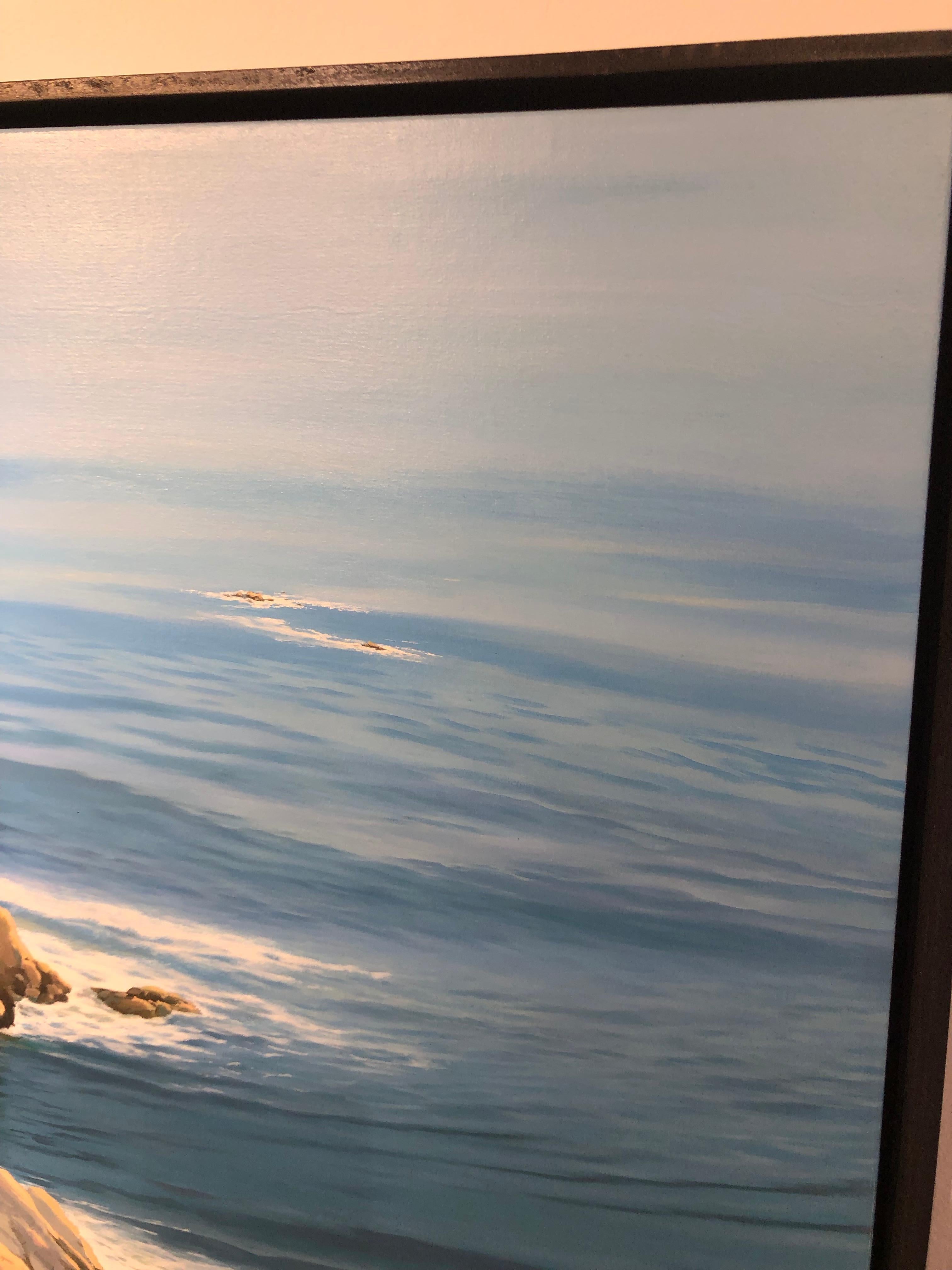 This original oil painting depicts on oceanside scene bathed in light with meticulous detail.  The artist often includes a narrative element to his work.  In this painting a bike has been laid down near the edge of a cliff, it's tires partially
