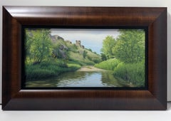 La ilusión de La Habana, paisaje muy detallado con agua y colinas ondulantes