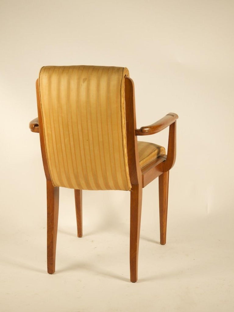 Two pairs of French modernist Art Deco armchairs/pull-up chairs by Rene Prou, circa 1930 in French walnut. Model exhibited at 1929 Salon d’Automne and pictured in the book, Rene Prou, Between Art Deco and Modernism. The last several photos show the