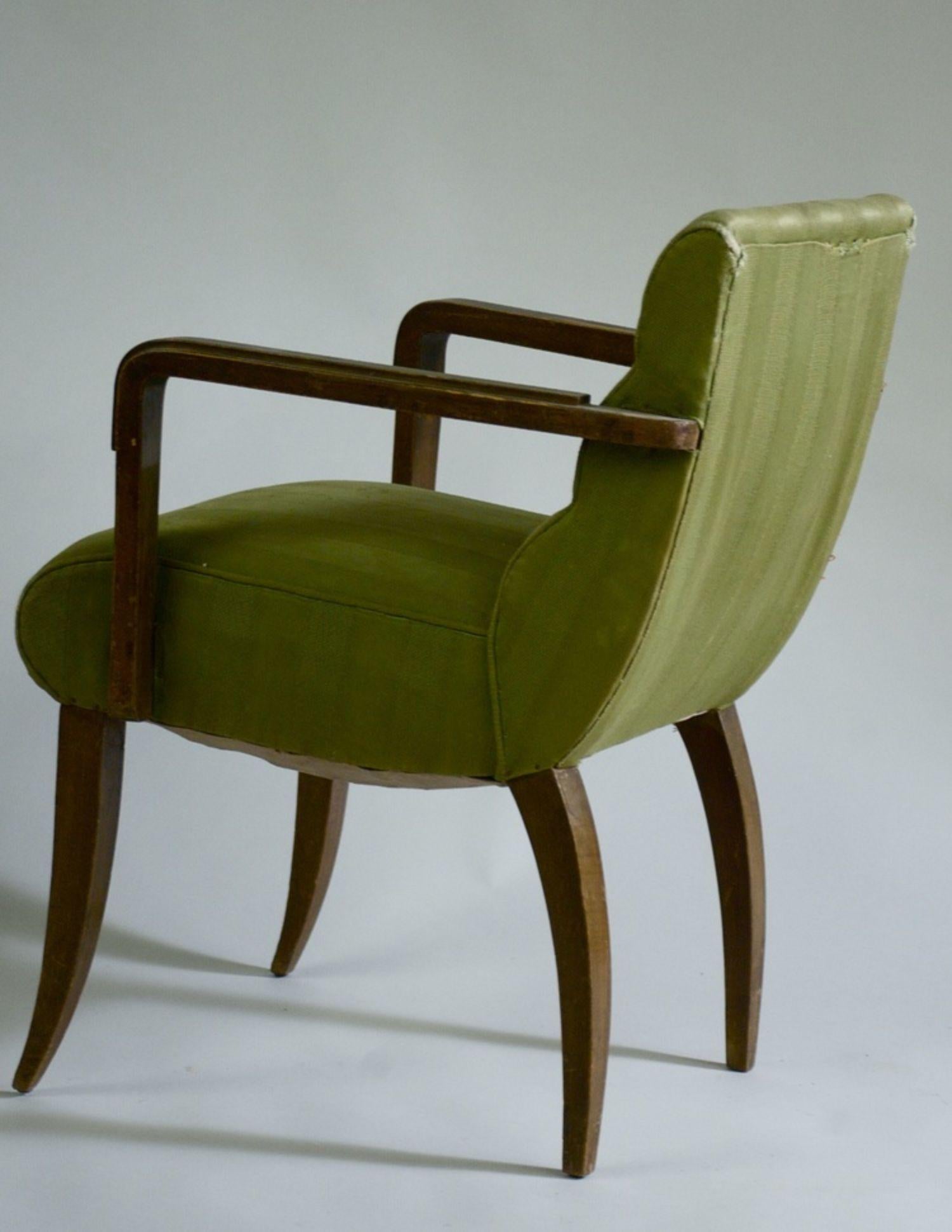 French Art Deco pair of small scale arm/pull up chairs by Rene Prou. 

These chairs are unrestored in the photographs. Pricing include restoration, refinishing, and reupholstering using client supplied fabric.

Measures: 20 wide x 22 deep x 29