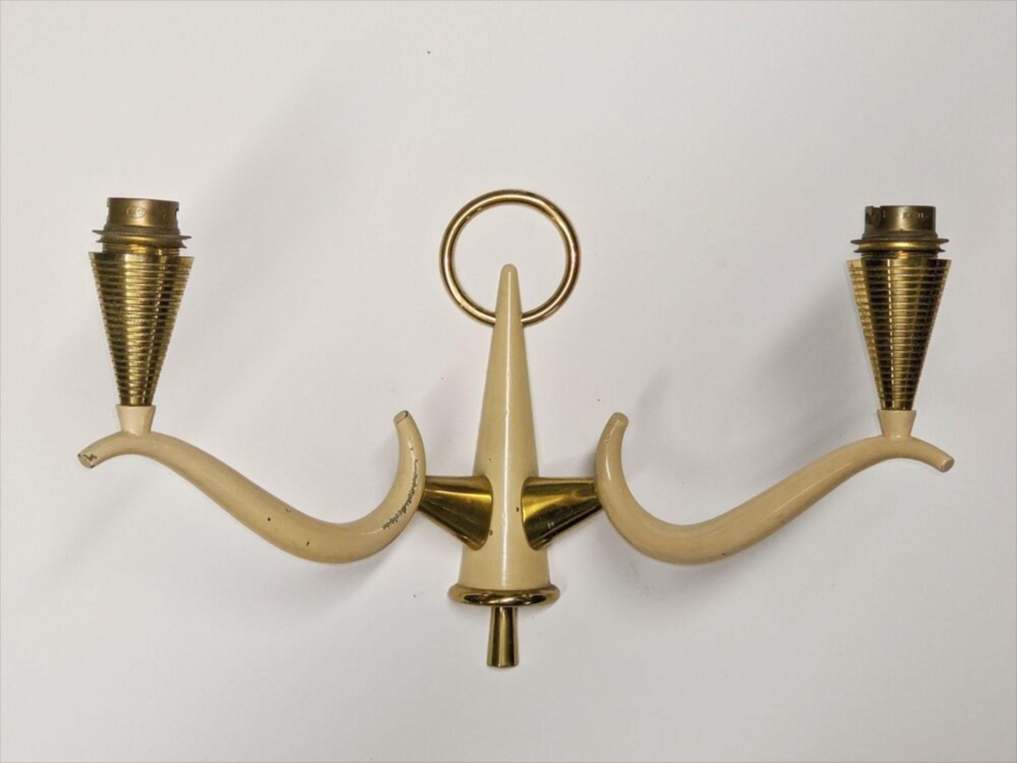 French 1940s Art Deco pair of two-branch bronze and lacquer sconces in the style of René Prou. Measures: 12” wide x 4” deep x 8” high.

          