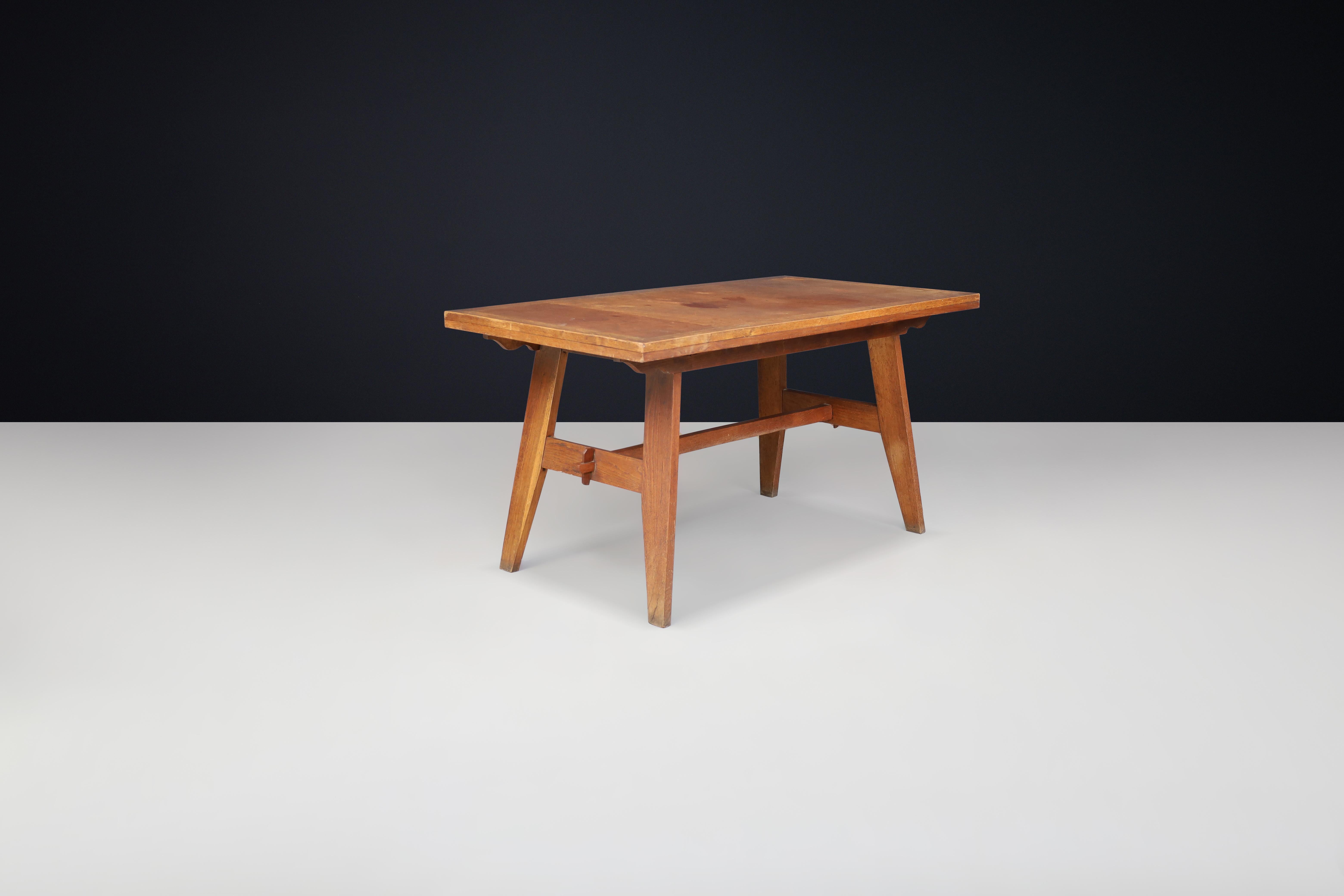 Renée Gabriel Patinated Oak Table, France, 1940s

This table, designed by renowned French decorator Renée Gabriel (1899–1950), exemplifies the functional elegance of post-war French modernist furniture. Measuring 70 cm deep, 135 cm wide, and 72 cm