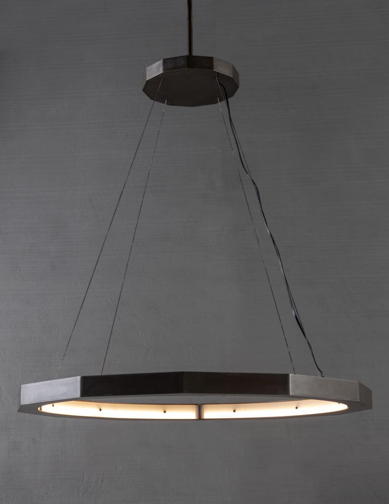 Modernist suspension octagon light.

Bulb LED continuous loop.

Handcrafted in Italy. Sold exclusively at Brendan Bass.

Minimum hanging height: 12