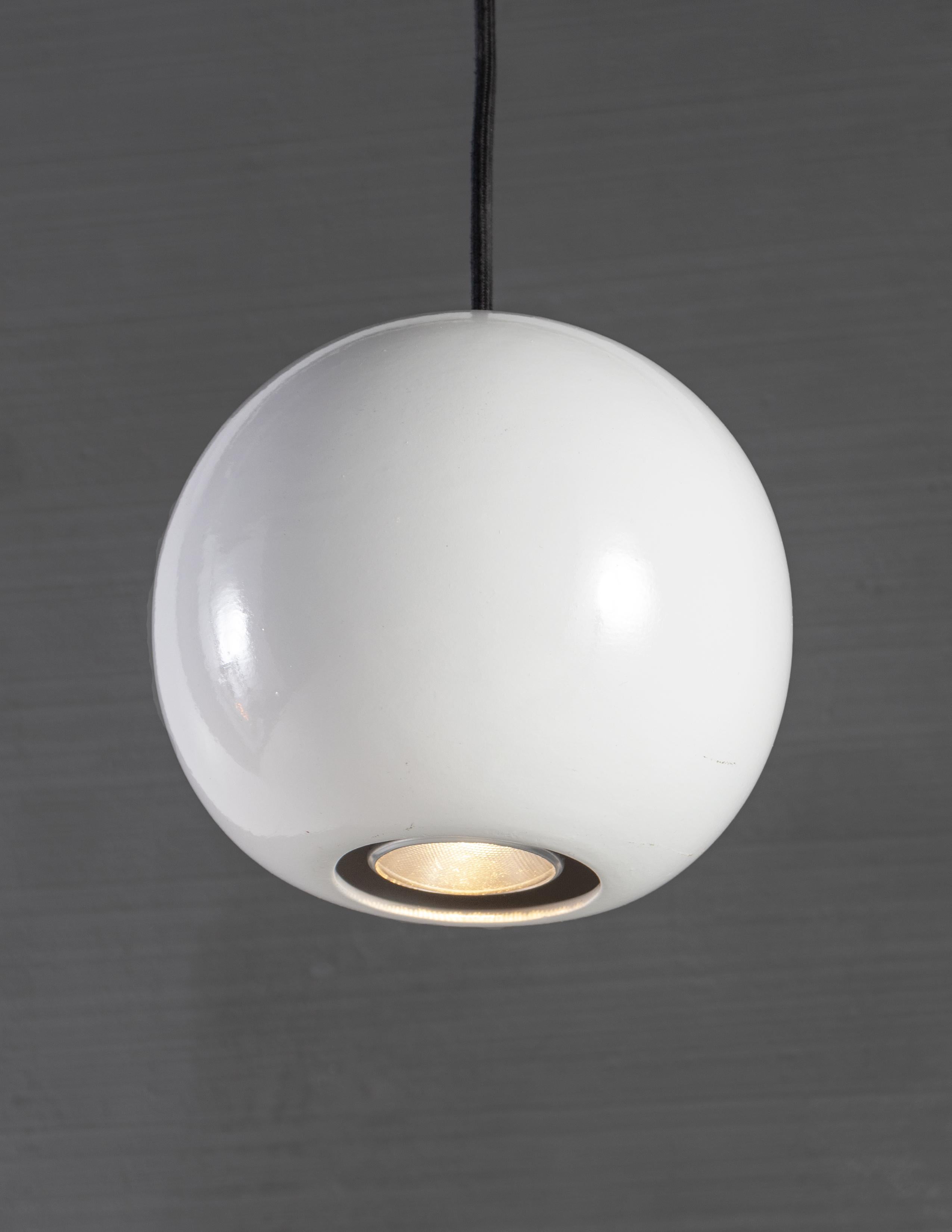 Ceramic ball form down light. Multiple colors, can be sold alone or as multiples. 

Custom canopy can be built in house.

Bulb 1 x LED only 7 watt parr 20. 5 lbs.

Handcrafted in Italy. Sold exclusively at Brendan Bass.

Measures: Minimum