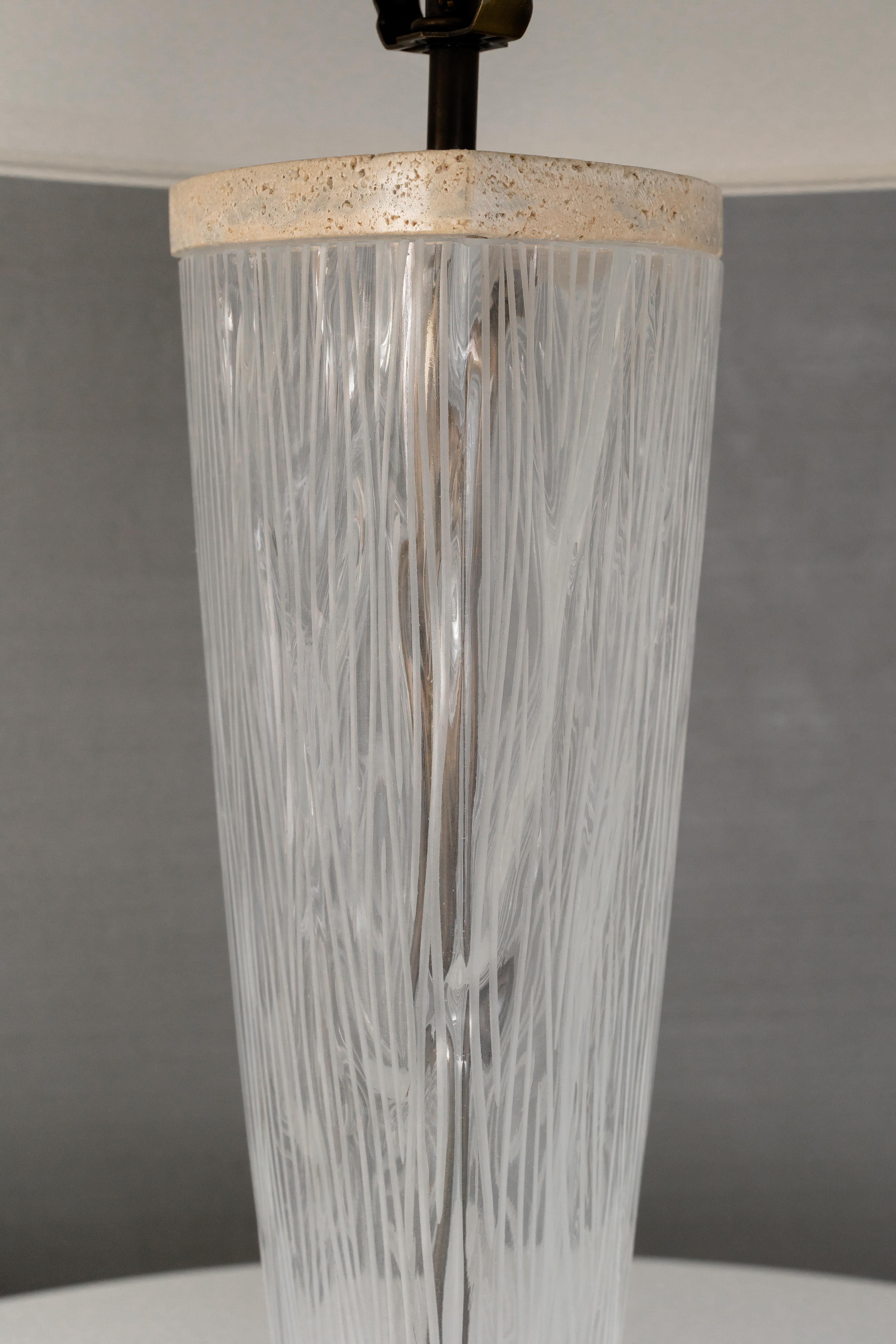 Mouth blown glass with variegated luminance. 

Bulb 1x medium base 60 watt incandescent. 5lbs. 

The Willow Pendant is a mouth blown glass form which celebrates the ageless craft of Italian glass making. Taken from the wood mould each piece is