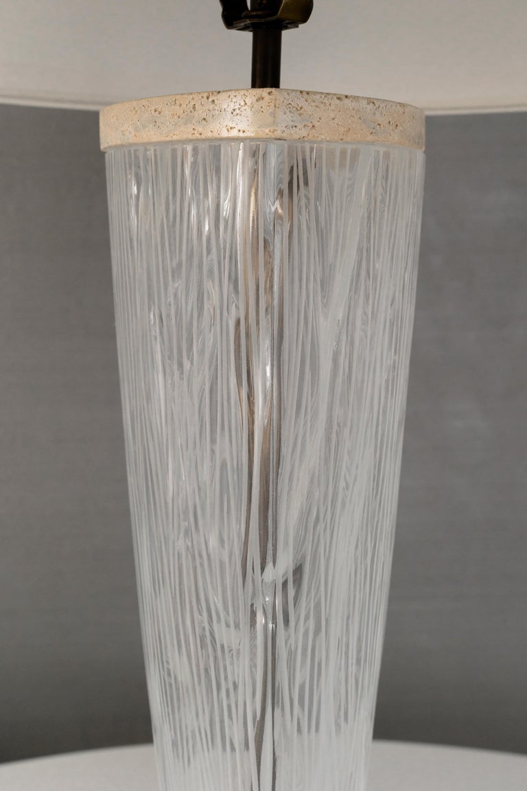 Mouth blown glass with variegated luminance. 

Bulb 1x medium base 60 watt incandescent. 5lbs. 

The Willow Pendant is a mouth blown glass form which celebrates the ageless craft of Italian glass making. Taken from the wood mould each piece is