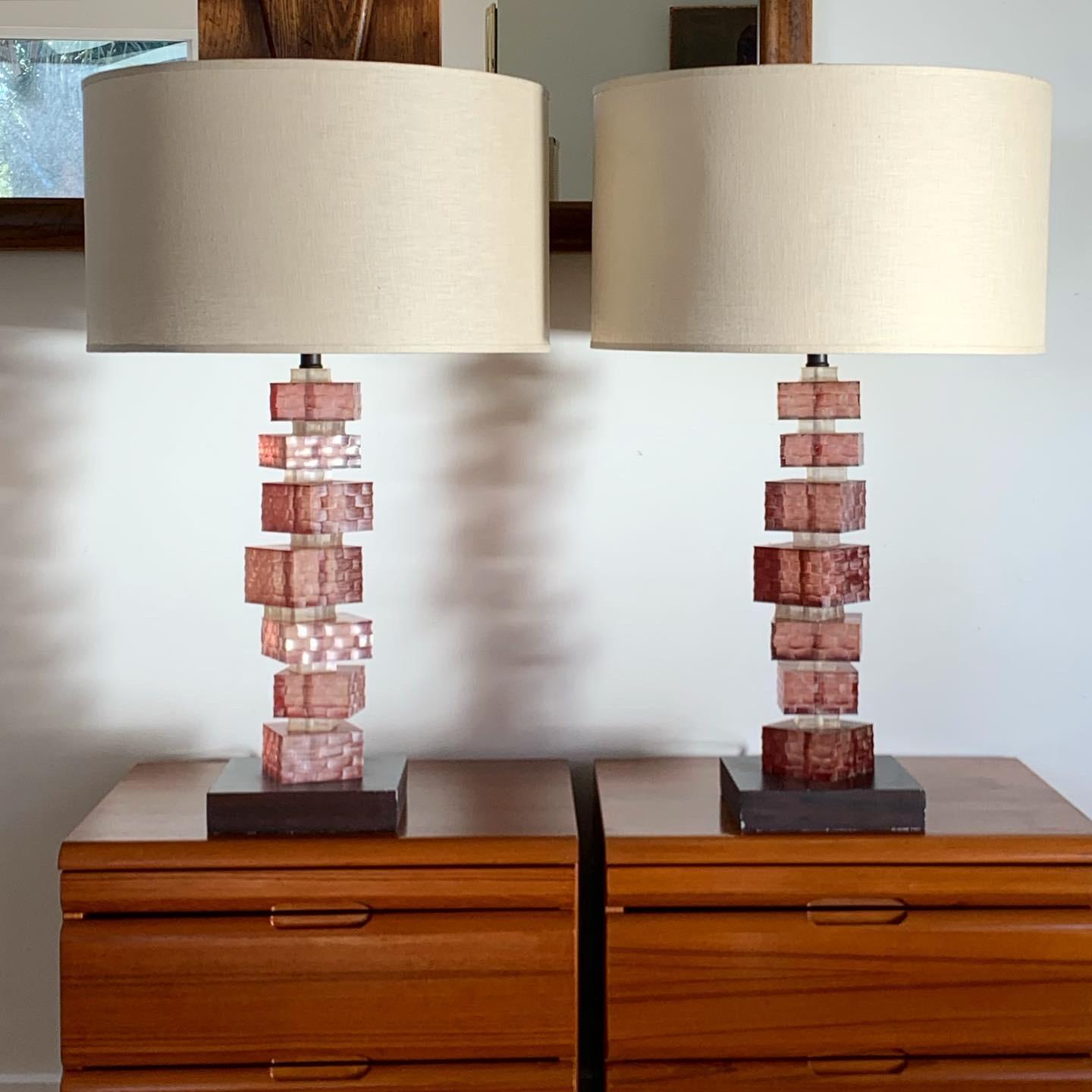 Pair of Modernist table lamps with chunky pink honeycombed lucite stacks and black walnut coated steel bases (shown here with linen Restoration Hardware barrel shades). By Rennaissance2000 (with an extra “n” - yes). Featured in Architectural Digest,