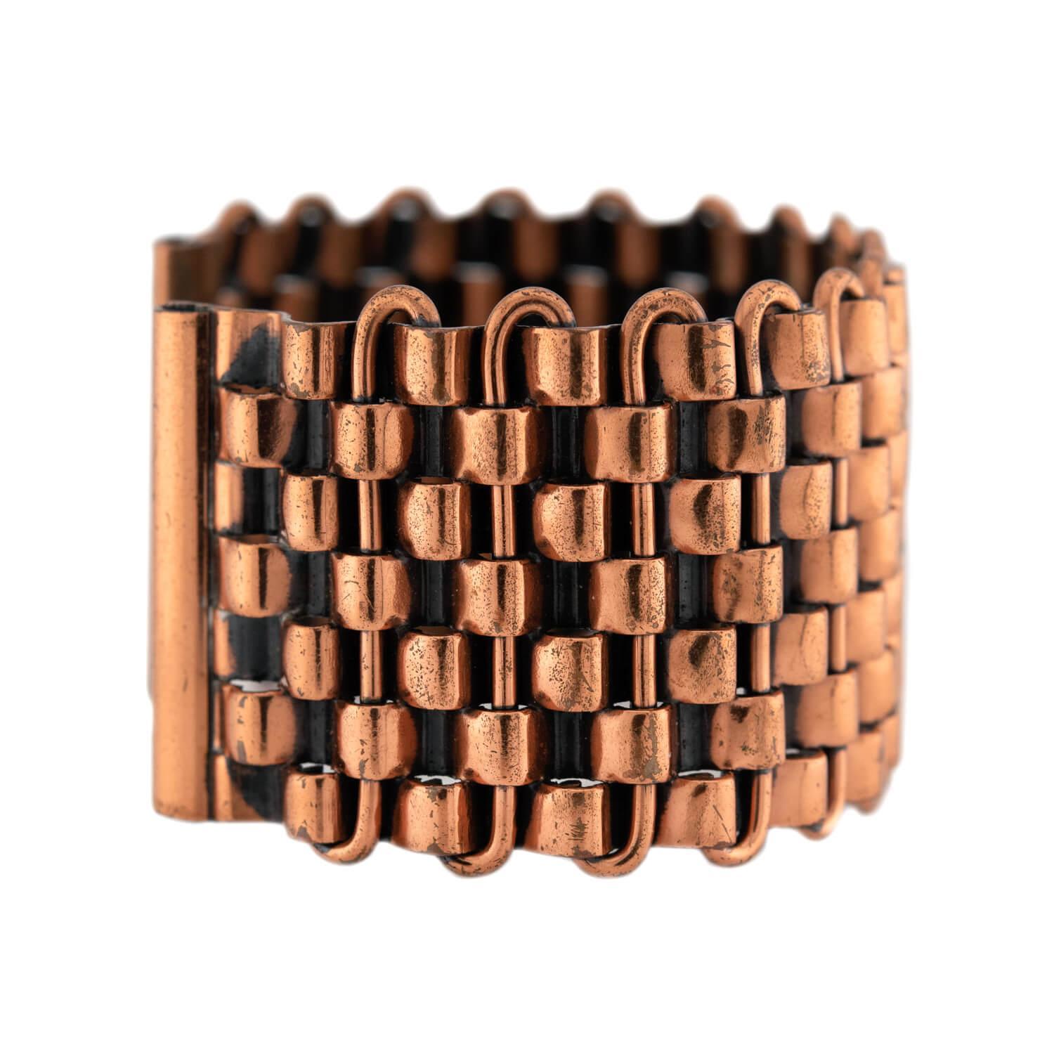 This fabulous vintage bracelet is a signed Renoir piece from the Vintage (ca1950s) era! Crafted in vibrant copper, the bracelet has a 