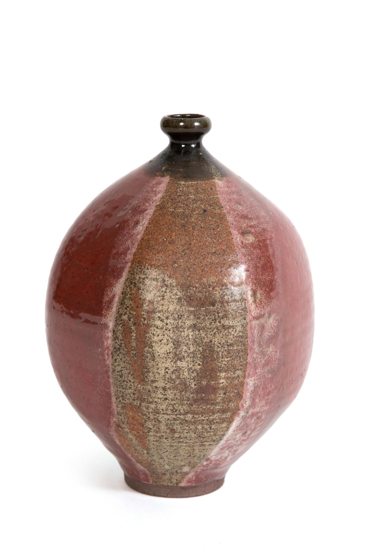 A 1960s multi-colored vessel by master ceramics craftsman Renzo Faggioli with signature on the bottom.
Mr. Faggioli teaches ceramics at The Moravian College in Bethlehem, PA and the Baum School of Art. His original ceramics education came from the