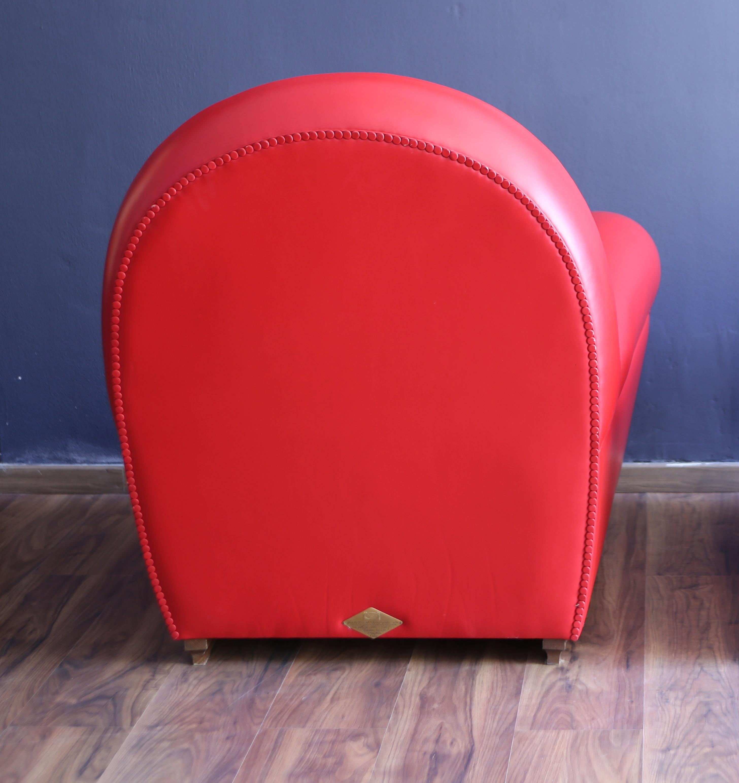 Altro Pair of Frau armchairs, model 904 “Vanity Fair” in red leather, 1980s in vendita