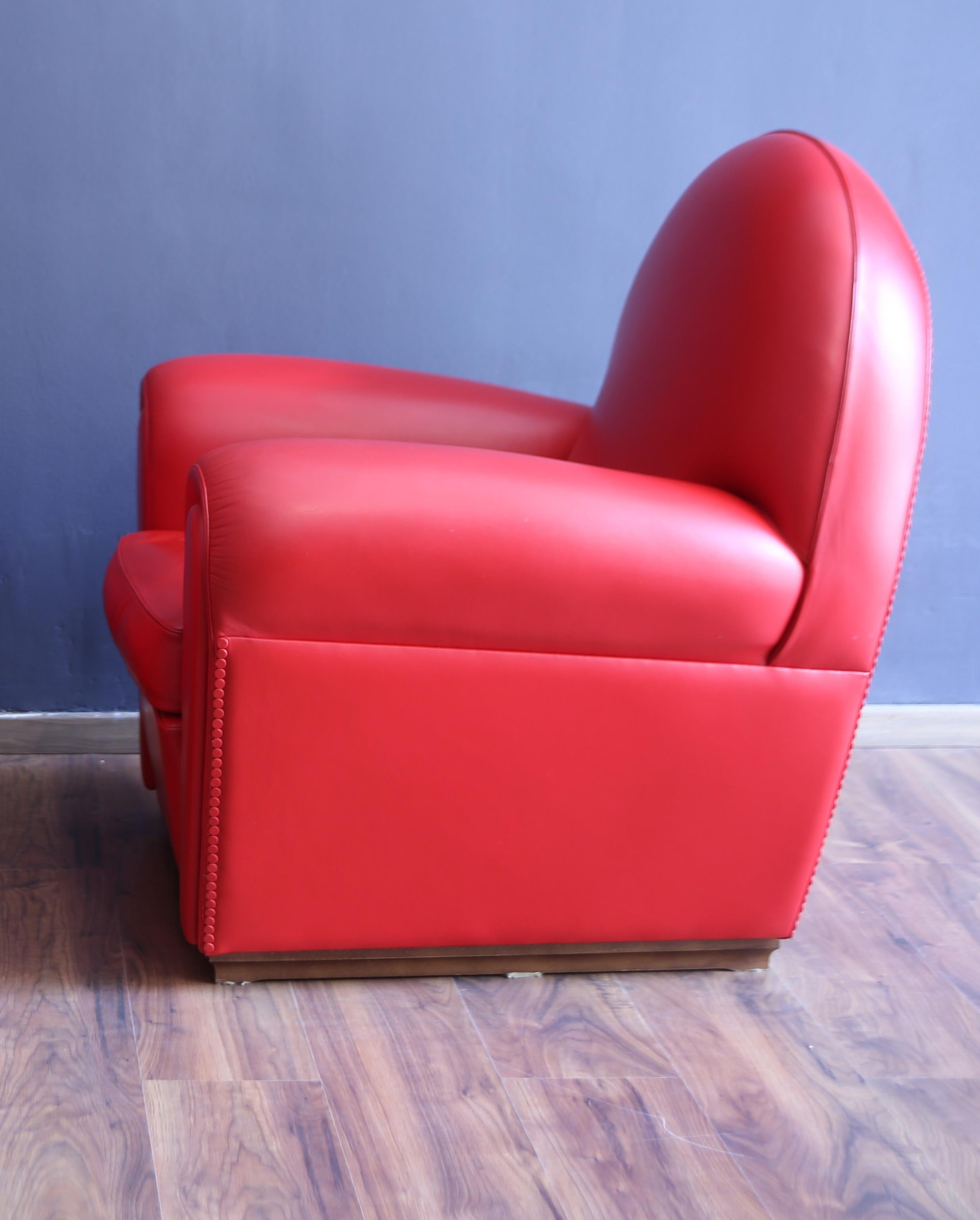 Pair of Frau armchairs, model 904 “Vanity Fair” in red leather, 1980s In condizioni ottime in vendita a Vigevano, PV