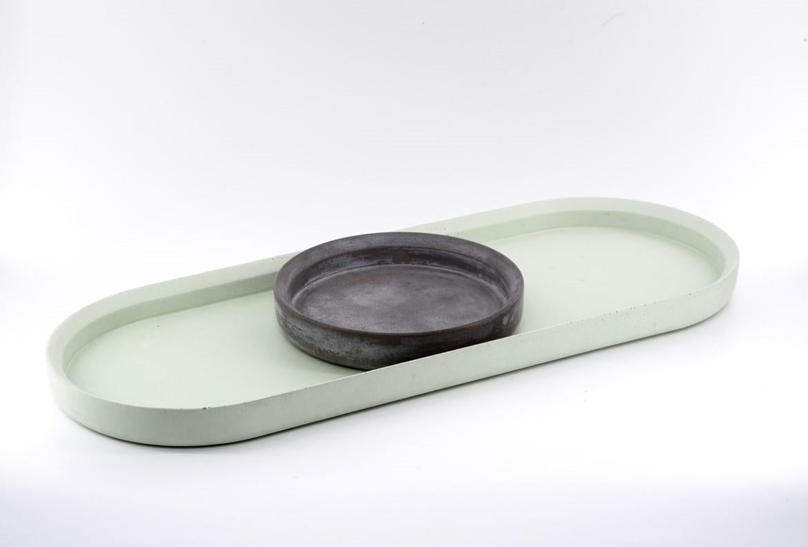 Renzo in a family of multipurpose trays with a very smooth surface and soft curved edges, now available in a different color composition. Each piece is a unique, no two are the same.

Mod III Measures: 60 x 23 x 4 cm.