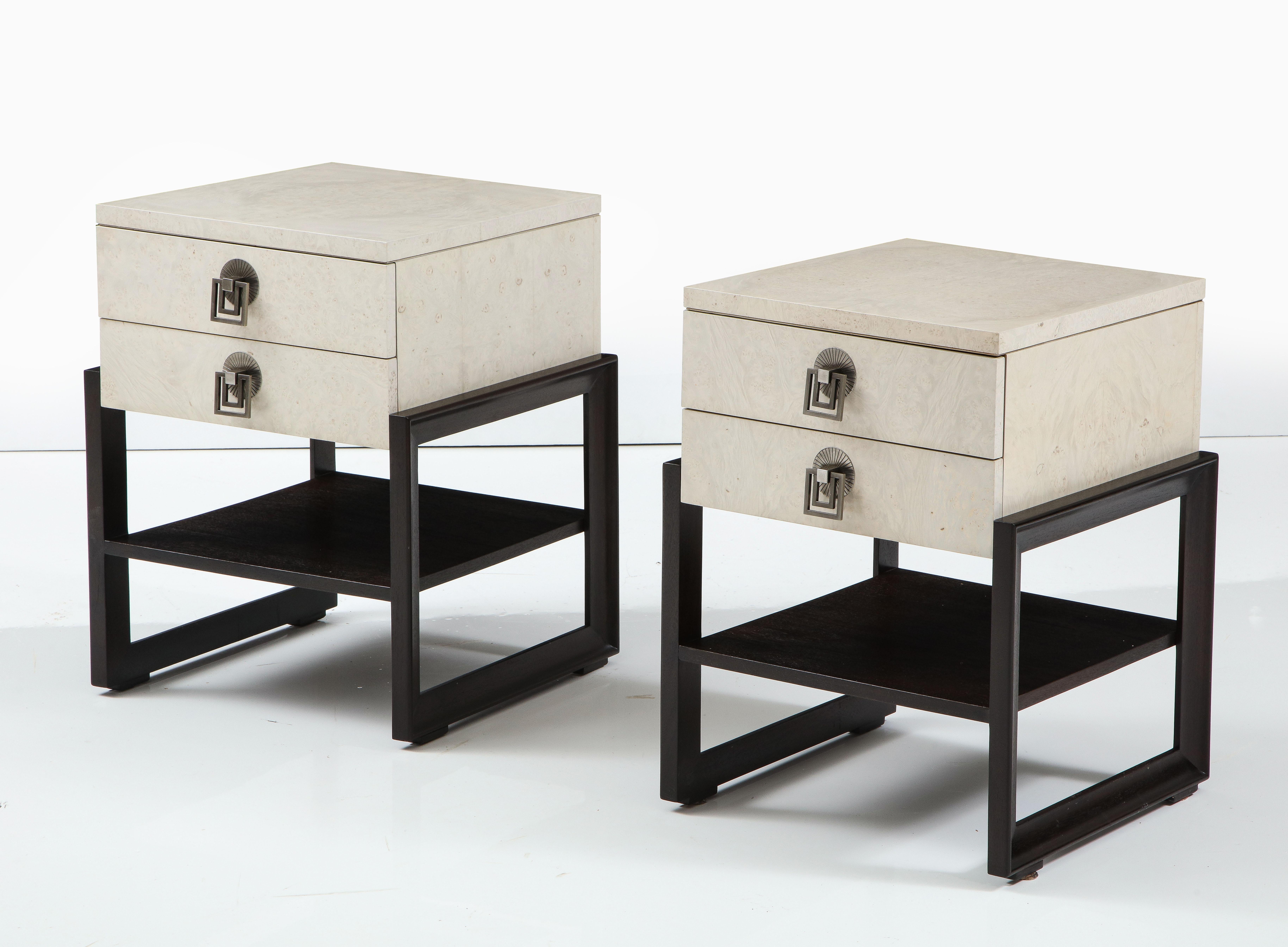Pair of custom finished nightstands featuring bleached birds eye maple with a pearl grey stain sitting on mahogany stands. Nightstands have 2 drawers with original hardware in a brushed nickel finish. Designed by Renzo Rutili for Johnson Bros.