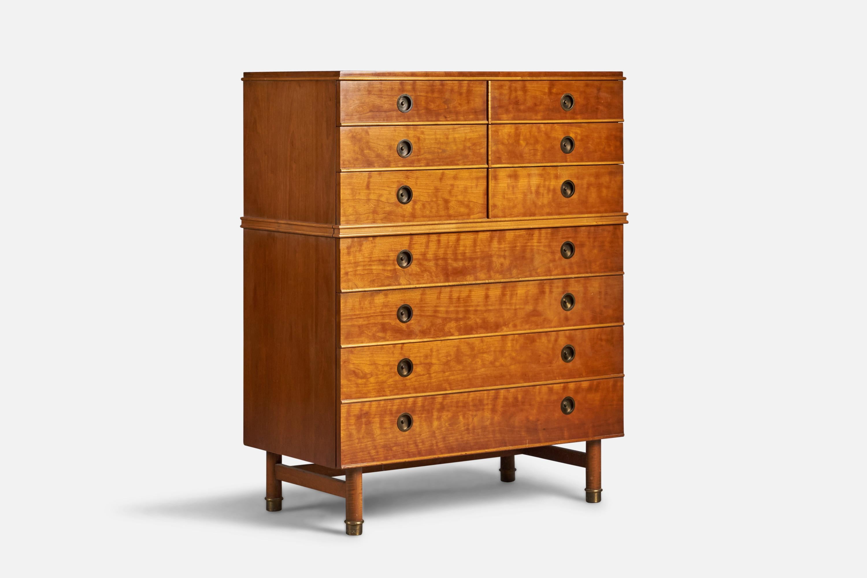 A mahogany, brass and maple chest of drawers produced by Johnson Furniture Company USA, c. 1950s. Design attributed to Renzo Rutili.