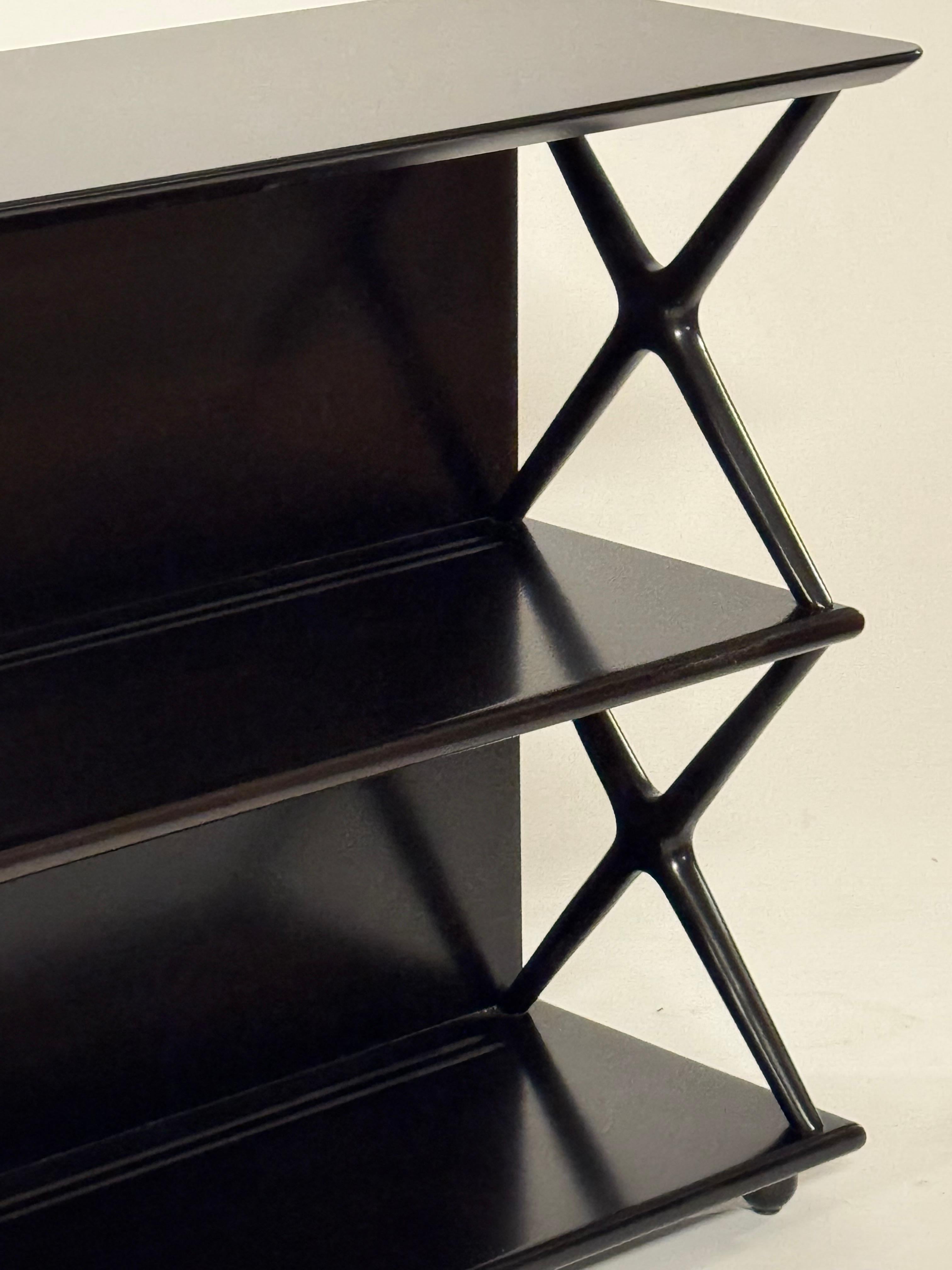 American Renzo Rutili for Johnson Furniture Co. 1950s Low X Form Two Shelf Bookcase For Sale