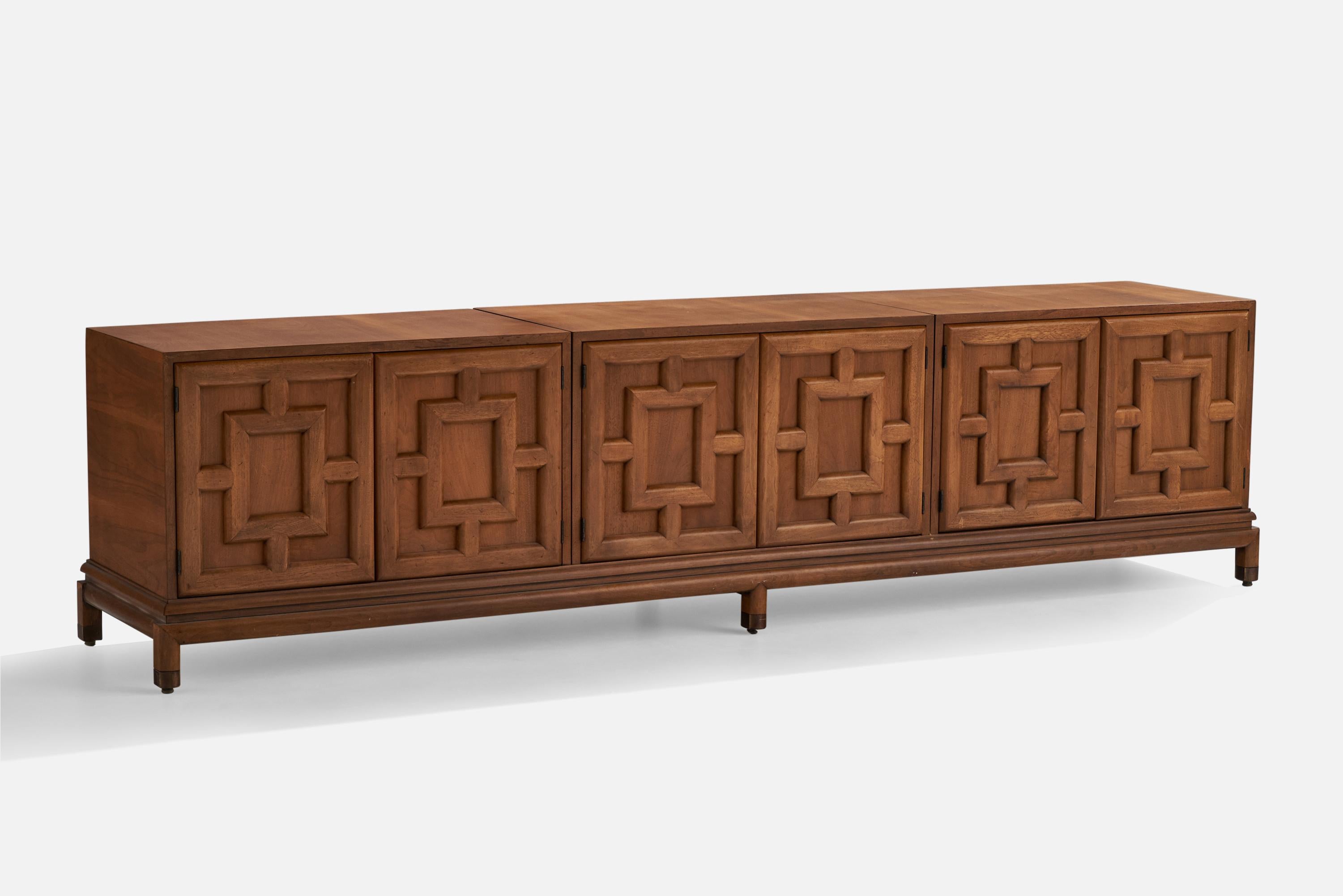 A long stained oak and brass cabinet or sideboard designed by Renzo Rutili and produced by Johnson Furniture Company, Grand Rapids, Michigan, c. 1950s.