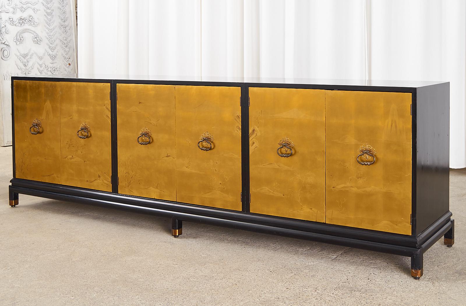 Rare Mid-Century Modern monumental 3 part sideboard cabinet or credenza designed by Renzo Rutilli (Lorenzo R. Rutilli 1901-1966) for Johnson Furniture Company. The cabinet features a three section case each with double doors opening to storage
