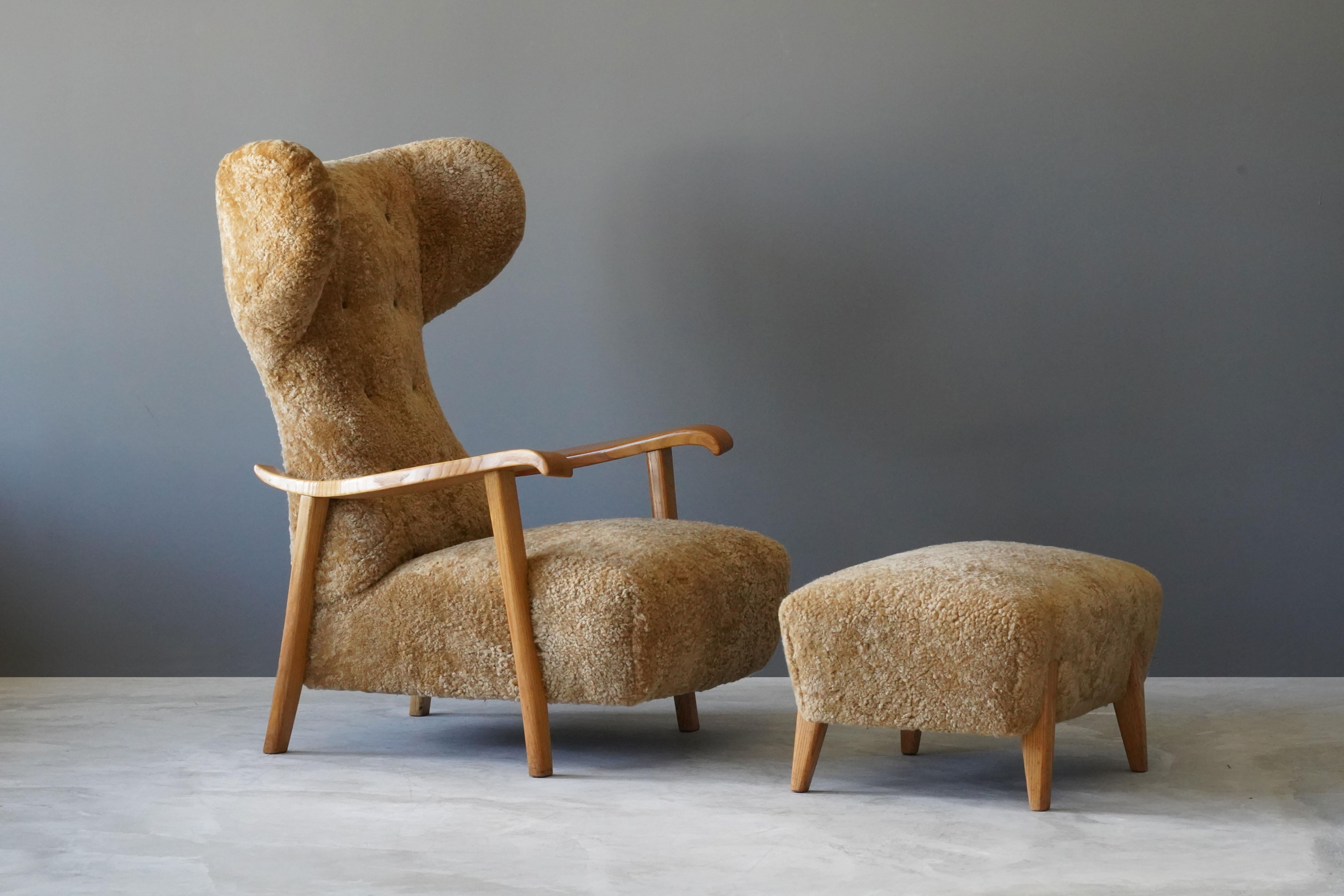 An organic modernist lounge chair with stool and ottoman. Produced in Italy in the 1940s. Design attributed to Renzo Zavanella. With its original stool. 

Other designers working in the organic style include Gio Ponti, Vladimir Kagan, Jean Royère,