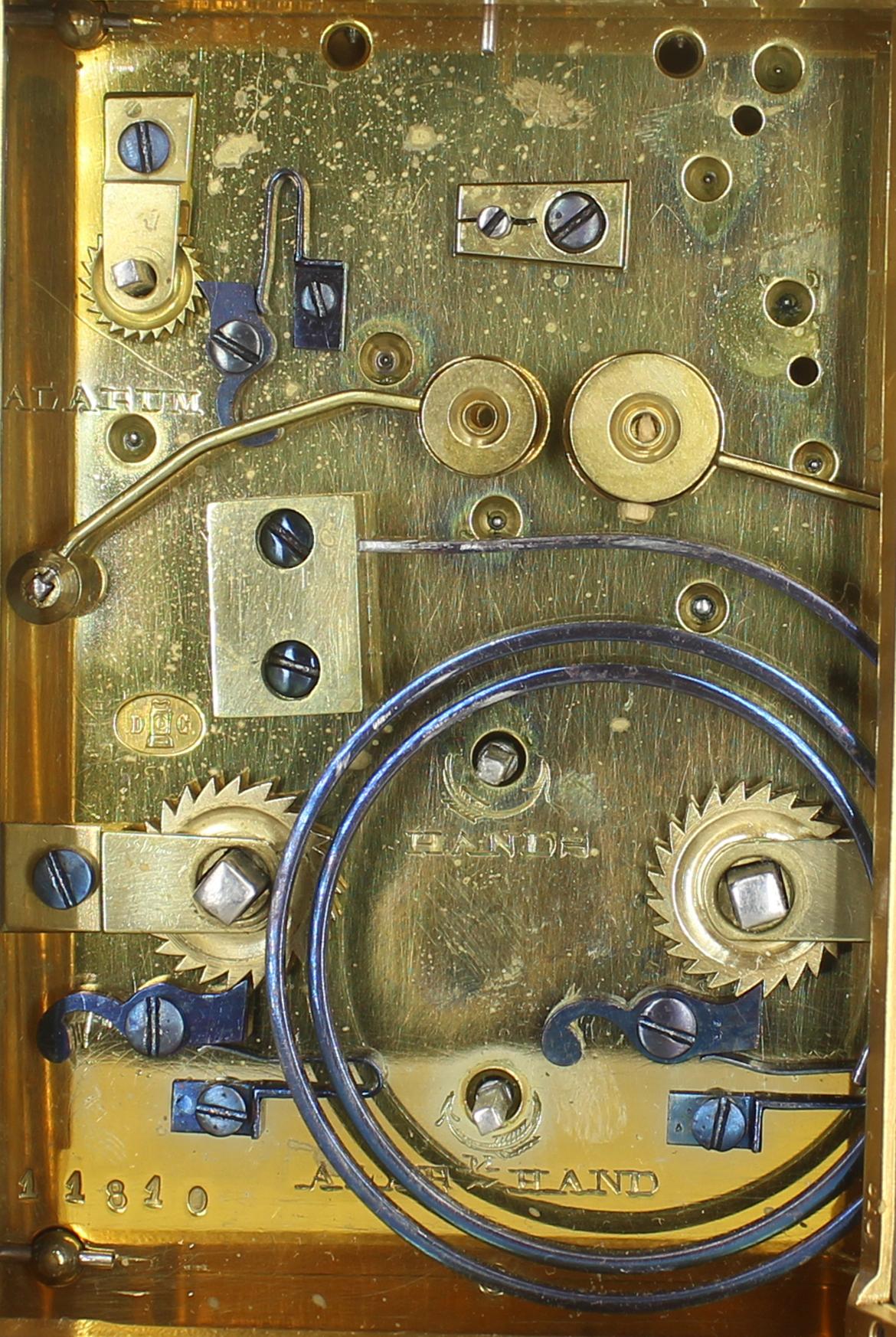 A strike repeat alarm carriage clock by Pierre Drocourt. Stamped and numbered with the Drocourt mark on the back plate in a gilded 'Gorge' case. Drocourt was one of the great carriage clock makers of the 19th Century, and this clock is a fine early