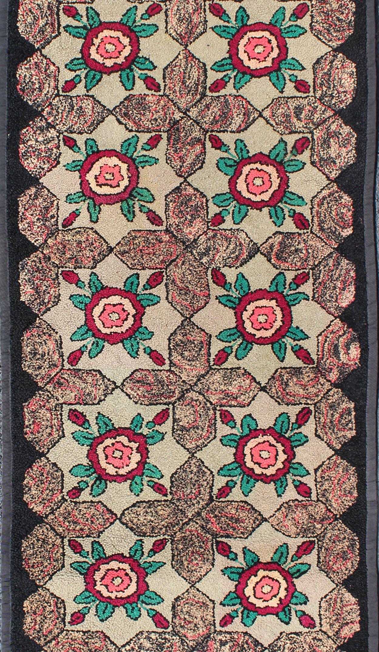 Floral antique American hooked rug with flower designs, rug G-0802, country of origin / type: United States / Hooked, circa 1910

Ingenious in style, color and composition, the features in this spectacular, antique American Hooked rug create an