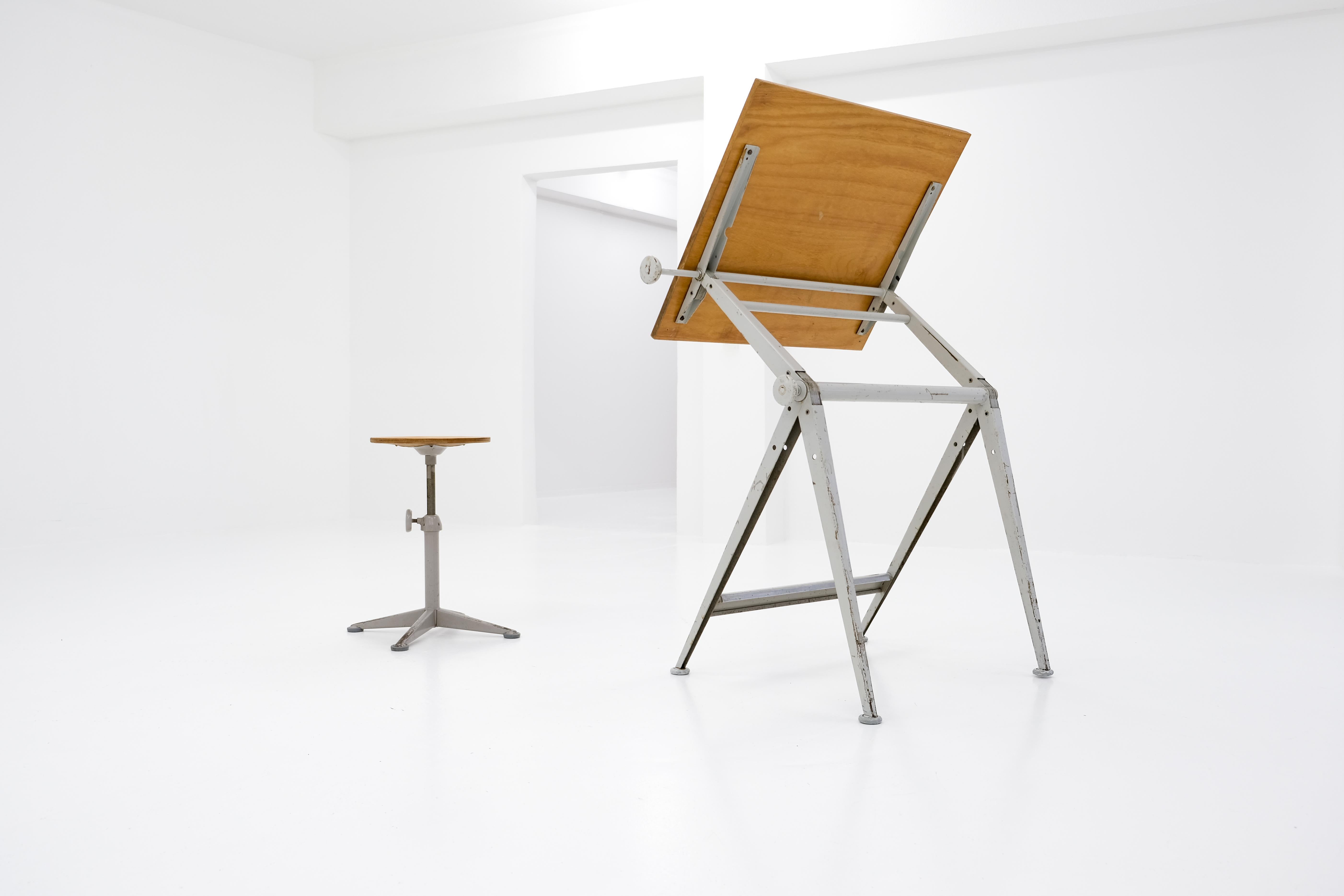The ‚reply‘ drawing table, designed in the 1950s by friso kramer & wim rietveld, is adjustable continuously from horizontal to vertical. so it works as a desk, bar table, flipboard – and, no joke, we have already sold it: as a diaper changing table