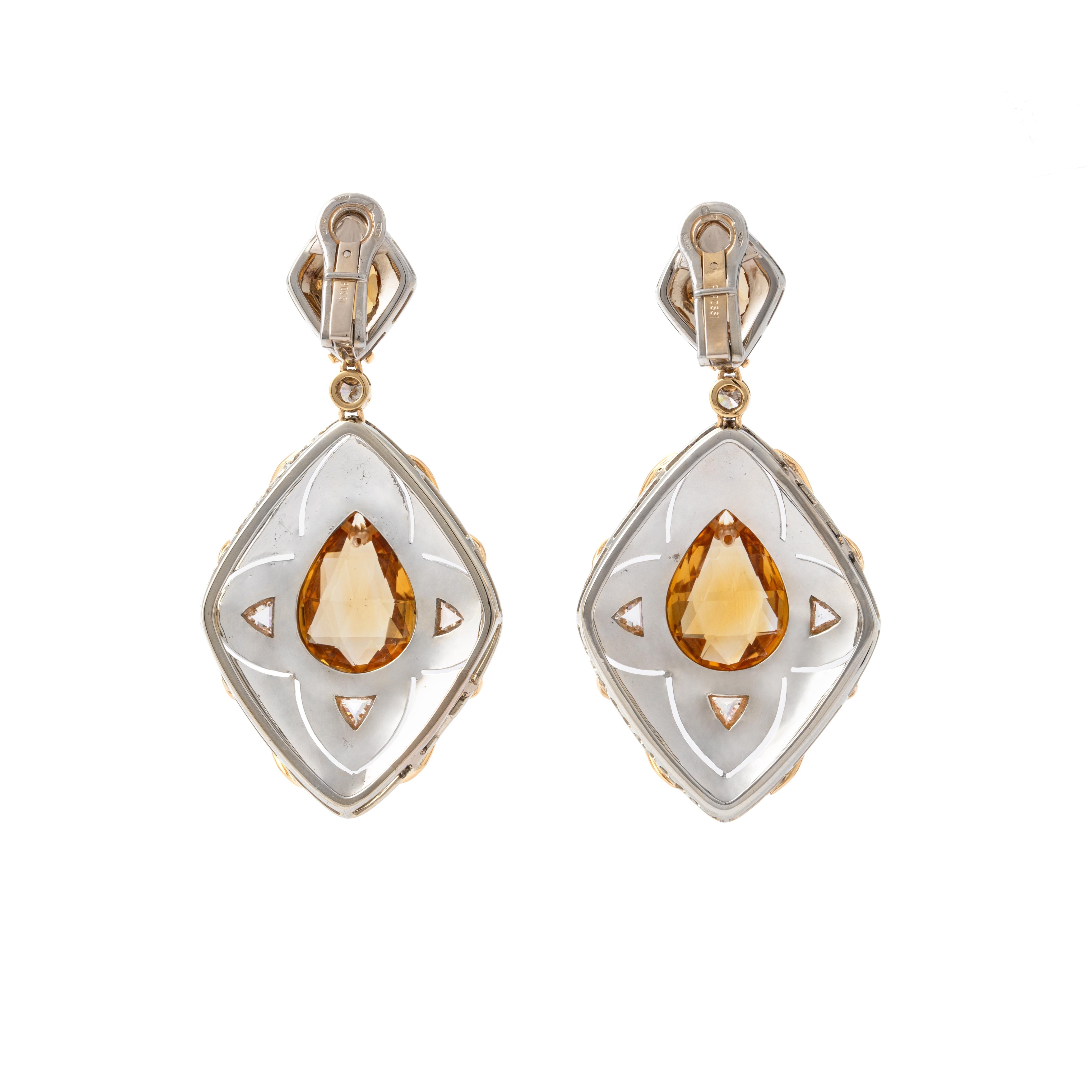 Repossi. Citrine and Diamond white and yellow gold 18K ear pendants. Late 20th century.

Total length: approx. 6.50 centimeters.
Total width: 4.10 centimeters.
Total weight: 42.12 grams.
