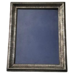 Repousse 0.835 silver picture frame , marked PV.