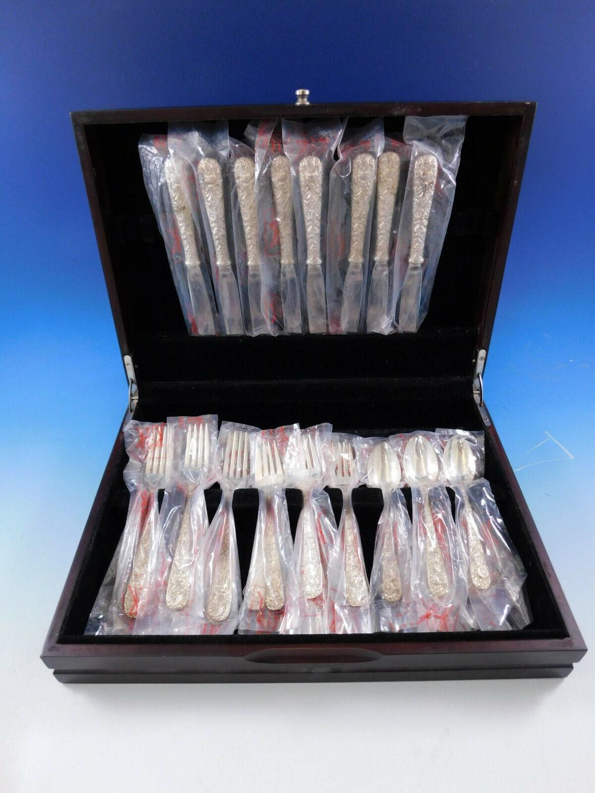 Unused Repousse by Kirk Sterling silver flatware set - 32 pieceas. This set includes:

8 knives, 9