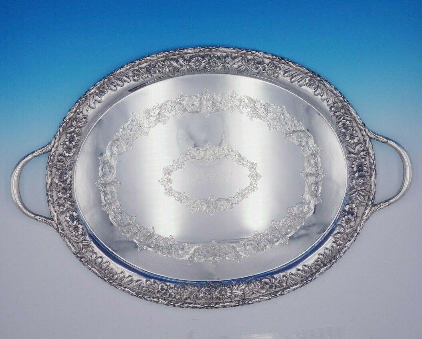 Repousse by Kirk

Gorgeous Repousse by Kirk sterling silver tea tray hand decorated and engraved with scrollwork. This piece is marked #124AF. 

The tray measures 33