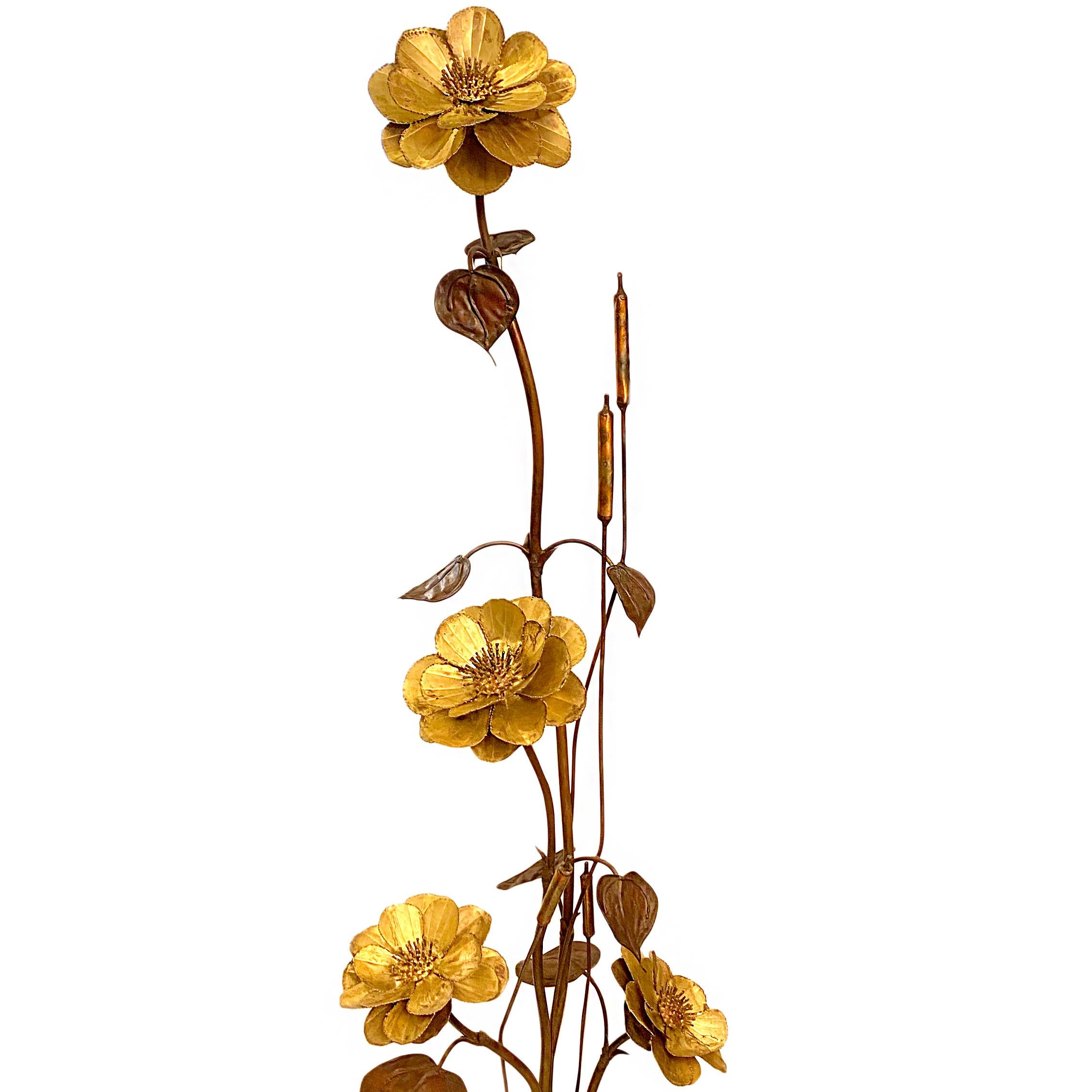 A large circa 1960's Italian repoussé metal foliage and floral decoration with stone base.

Measurements:
Height: 66