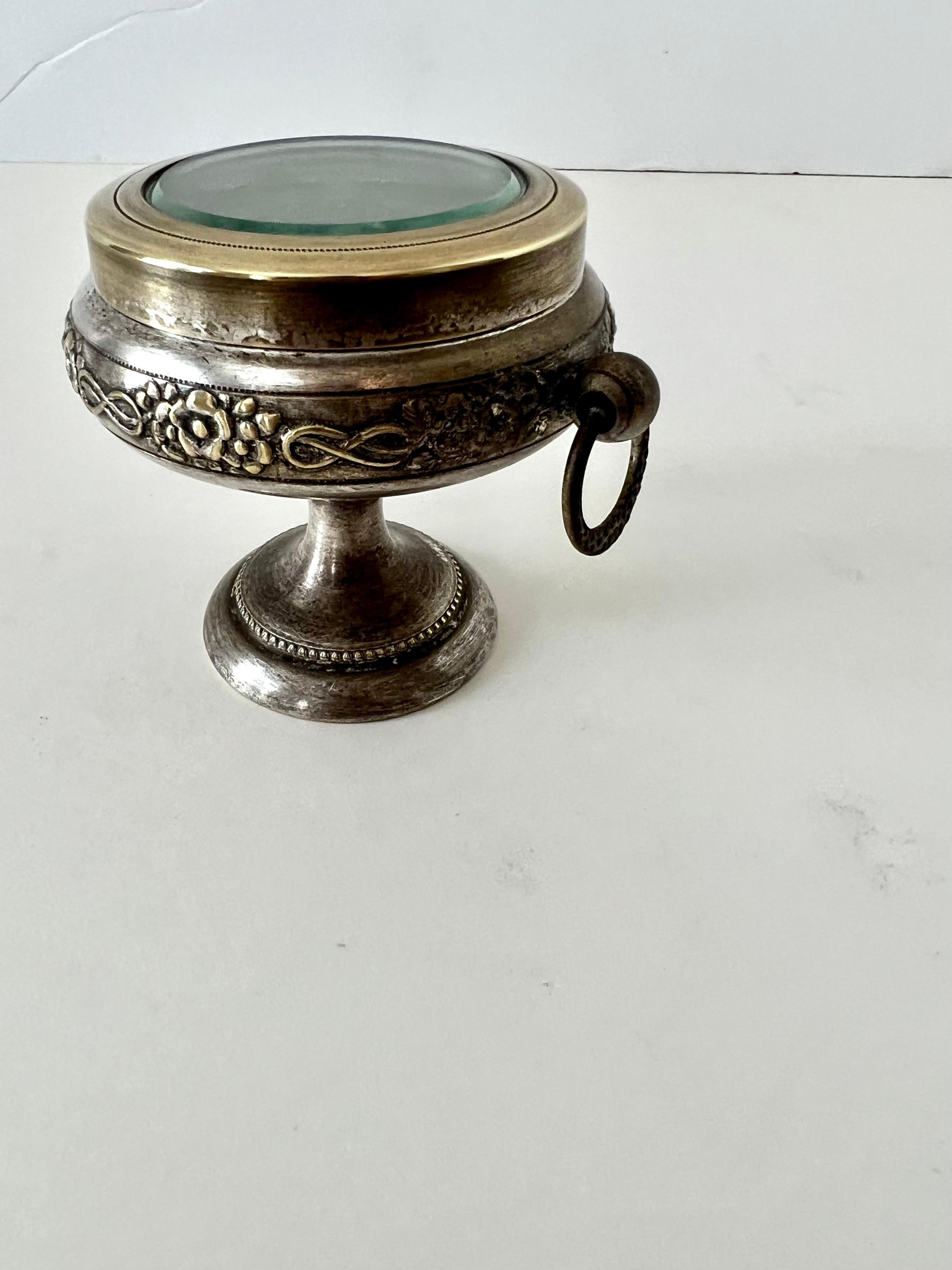 Patinated Repoussé Pedestal Casket Box of Brass and Metal with Glass Lid For Sale