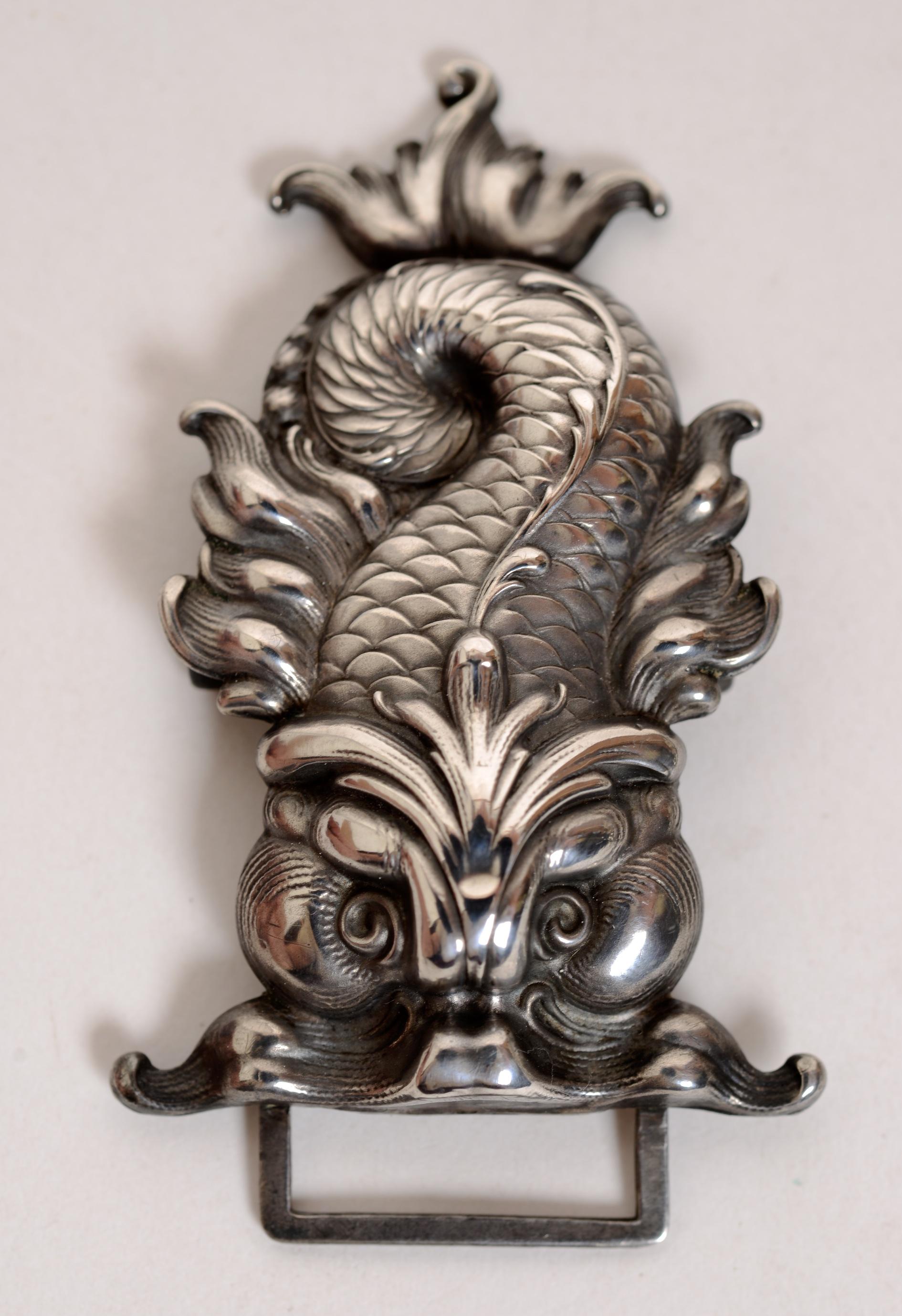 Repoussé Sterling Silver, Art Nouveau 2 Piece (Nurses) Belt Buckle of Baroque Stylized Dolphins, by William Kerr c1890. William B. Kerr Co. was a manufacturer of jewelry, flatware and hollow-ware. Established in Newark, New Jersey in 1855. They were