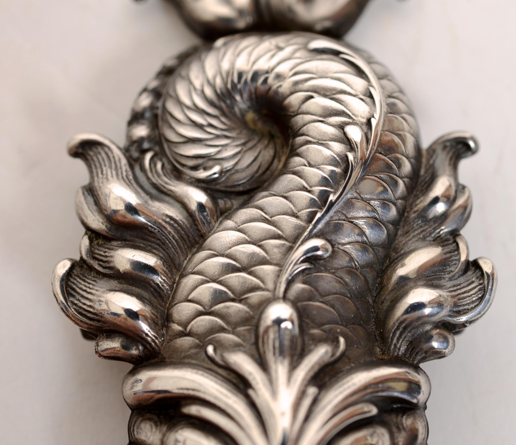 Women's Repoussé Sterling Silver Belt Buckle of Baroque Dolphins, by William Kerr c1890
