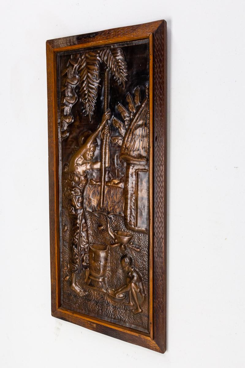 Mid-Century Modern Representation of an African Woman Embossed Copper and Iroko Frame For Sale